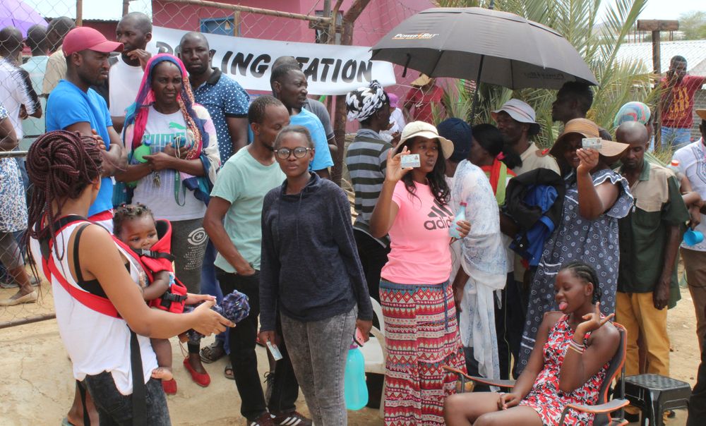 Namibians queue to cast their votes at a polling station near Windhoek, Namibia in the country's elections Wednesday, Nov. 27, 2019. Namibian President Hage Geingob's ruling party faces its biggest challenge since independence nearly three decades ago. The resource-rich southern African nation's registered 1.3 million voters are voting for president and National Assembly members. (AP Photo/Brandon van Wyk) Namibians queue to cast their votes at a polling station near Windhoek, Namibia in the country's elections Wednesday, Nov. 27, 2019. Namibian President Hage Geingob's ruling party faces its biggest challenge since independence nearly three decades ago. The resource-rich southern African nation's registered 1.3 million voters are voting for president and National Assembly members. (AP Photo/Brandon van Wyk)