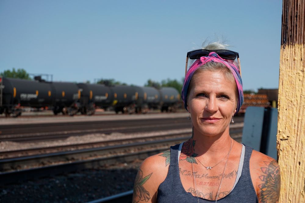In this Thursday, Sept. 5, 2019 photo Blackjewel warehouse technician Melissa Worden, poses for a photo in Gillette, Wyo. The shutdown of Blackjewel LLC's Belle Ayr and Eagle Butte mines in Wyoming since July 1, 2019 has added yet more uncertainty to the Powder River Basin's struggling coal economy. (AP Photo/Mead Gruver) In this Thursday, Sept. 5, 2019 photo Blackjewel warehouse technician Melissa Worden, poses for a photo in Gillette, Wyo. The shutdown of Blackjewel LLC's Belle Ayr and Eagle Butte mines in Wyoming since July 1, 2019 has added yet more uncertainty to the Powder River Basin's struggling coal economy. (AP Photo/Mead Gruver)