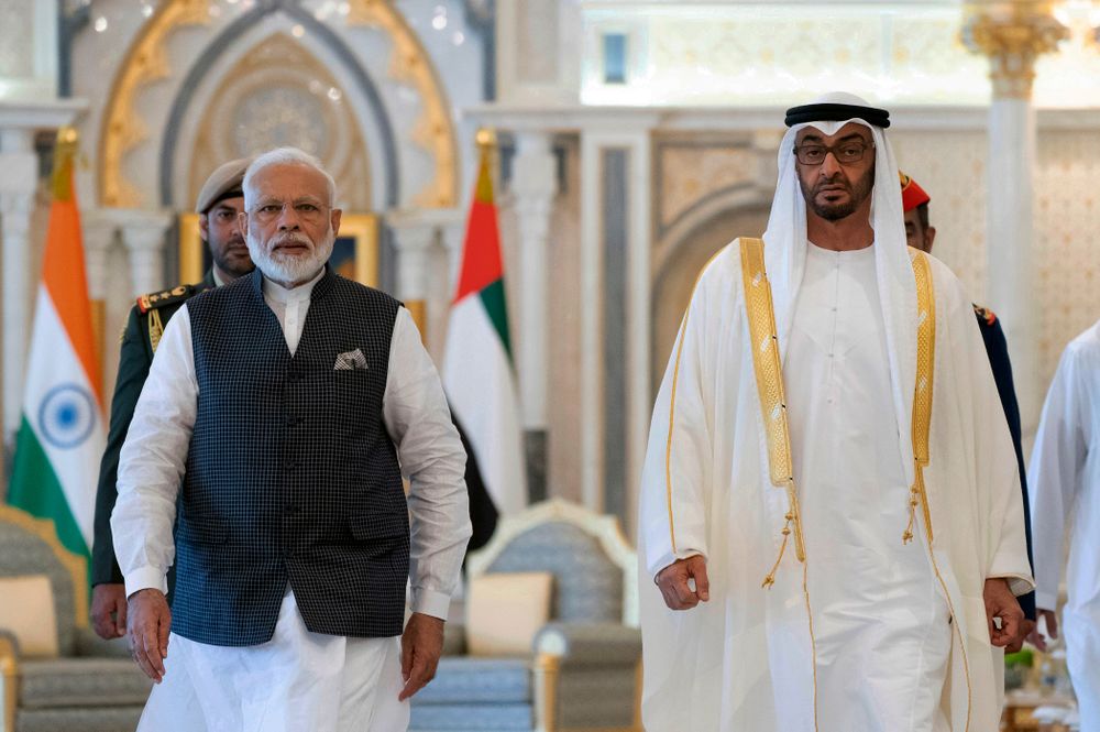 In this photograph made available by the state-run WAM news agency, Indian Prime Minister Narendra Modi, left, walks with Sheikh Mohammed bin Zayed Al Nahyan, right, in Abu Dhabi, United Arab Emirates, Saturday, Aug. 24, 2019. Modi is on a trip to both the United Arab Emirates and Bahrain, reinforcing ties between India and the Gulf Arab nations as he pursues stripping statehood from the disputed Muslim-majority region of Kashmir. (Ryan Carter - Ministry of Presidential Affairs/WAM via AP) In this photograph made available by the state-run WAM news agency, Indian Prime Minister Narendra Modi, left, walks with Sheikh Mohammed bin Zayed Al Nahyan, right, in Abu Dhabi, United Arab Emirates, Saturday, Aug. 24, 2019. Modi is on a trip to both the United Arab Emirates and Bahrain, reinforcing ties between India and the Gulf Arab nations as he pursues stripping statehood from the disputed Muslim-majority region of Kashmir. (Ryan Carter - Ministry of Presidential Affairs/WAM via AP)