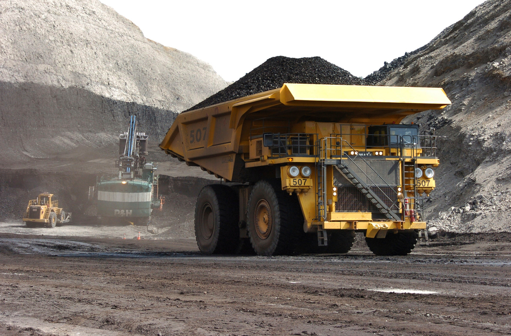 FILE - In this April 4, 2013, file photo, a truck carrying 250 tons of coal hauls the fuel to the surface of the Spring Creek mine near Decker, Mont. Federal officials say the Trump administration's decision to lift a moratorium on coal sales from public lands could hasten the release of more than 5 billion tons of greenhouse gasses. The report comes after a court ruled last month that the administration failed to consider the environmental effects of its resumption in 2017 of coal sales. A moratorium had been imposed under President Barack Obama over worries about climate change. (AP Photo/Matthew Brown, File) FILE - In this April 4, 2013, file photo, a truck carrying 250 tons of coal hauls the fuel to the surface of the Spring Creek mine near Decker, Mont. Federal officials say the Trump administration's decision to lift a moratorium on coal sales from public lands could hasten the release of more than 5 billion tons of greenhouse gasses. The report comes after a court ruled last month that the administration failed to consider the environmental effects of its resumption in 2017 of coal sales. A moratorium had been imposed under President Barack Obama over worries about climate change. (AP Photo/Matthew Brown, File)