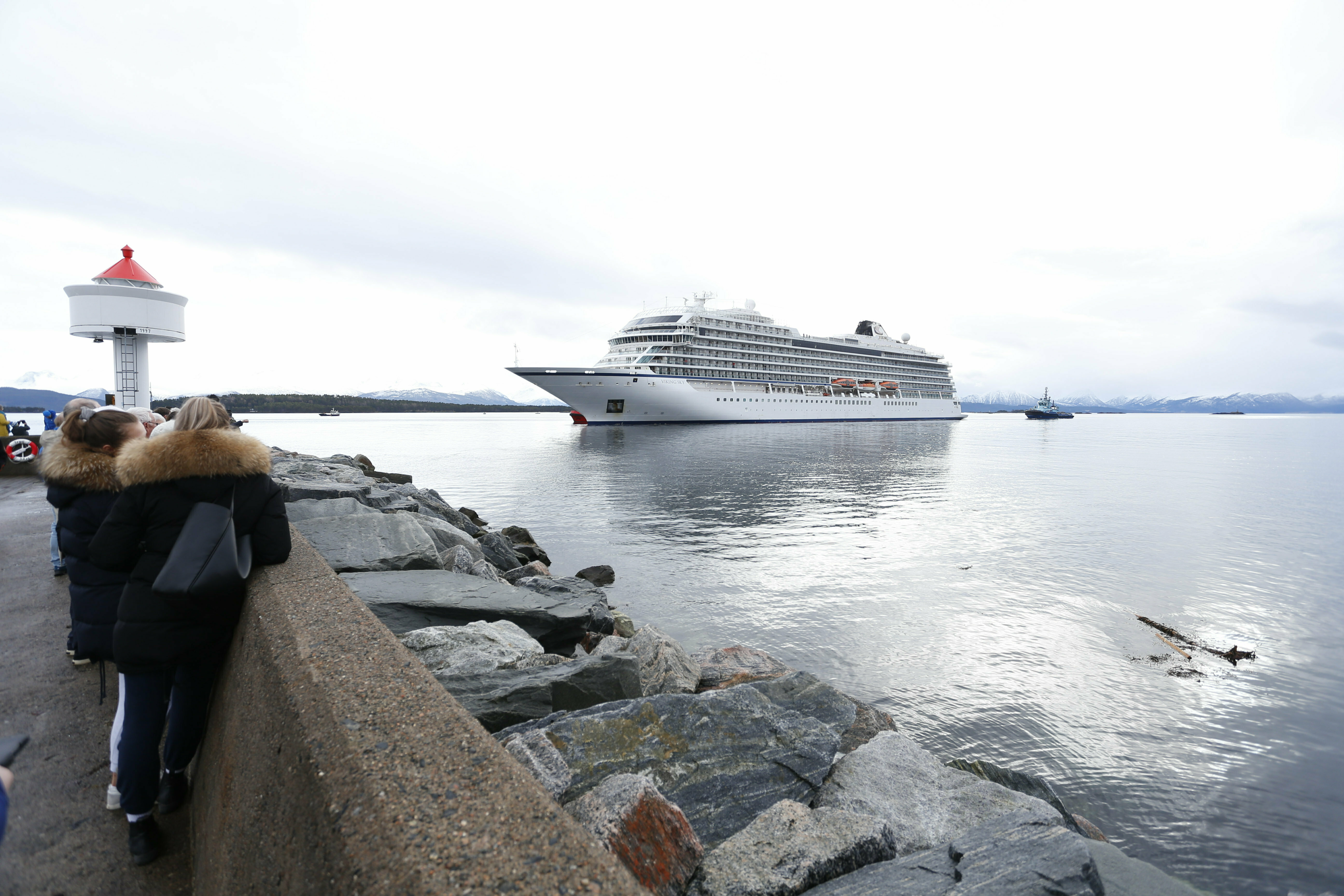 The cruise ship Viking Sky arrives at port off Molde, Norway, Sunday March 24, 2019, after having problems and issuing a Mayday call on Saturday in heavy seas off Norway's western coast. Rescue helicopters took more than 475 passengers from a cruise ship that got stranded off Norway's western coast in bad weather before the vessel departed for a nearby port under escort and with nearly 900 people still on board, the ship's owner said Sunday. (Svein Ove Ekornesvag/NTB scanpix via AP) The cruise ship Viking Sky arrives at port off Molde, Norway, Sunday March 24, 2019, after having problems and issuing a Mayday call on Saturday in heavy seas off Norway's western coast. Rescue helicopters took more than 475 passengers from a cruise ship that got stranded off Norway's western coast in bad weather before the vessel departed for a nearby port under escort and with nearly 900 people still on board, the ship's owner said Sunday. (Svein Ove Ekornesvag/NTB scanpix via AP)