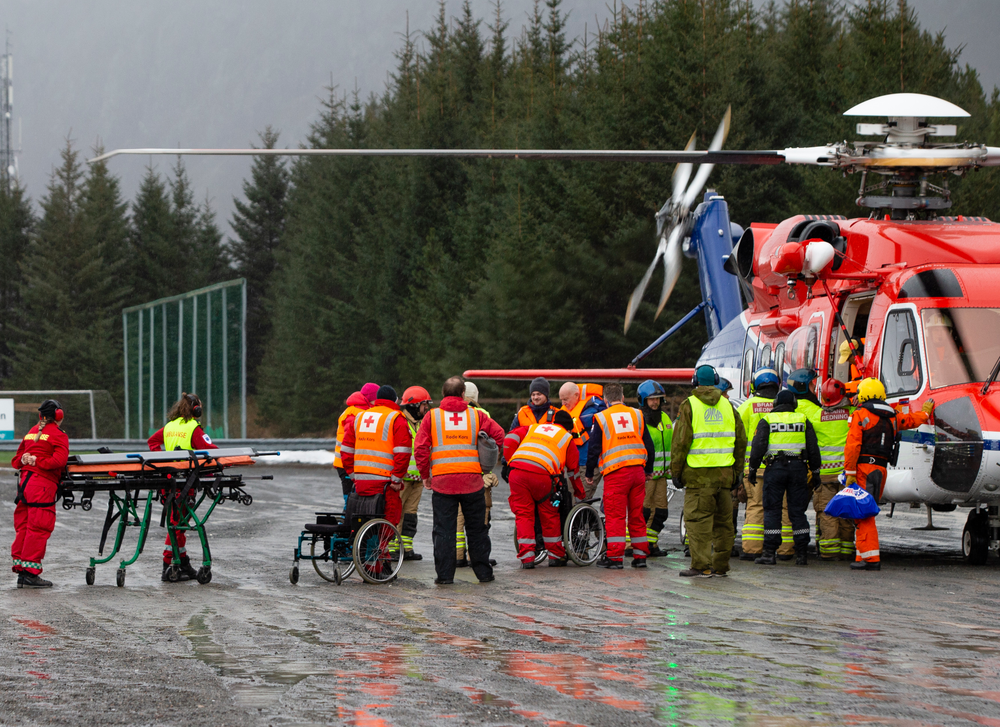 Passengers are helped from a rescue helicopter in Fraena, Norway, Sunday March 24, 2019, after being rescued from the Viking Sky cruise ship. Rescue workers are evacuating more passengers from a cruise ship that had engine problems in bad weather off Norway's western coast while authorities prepare to tow the vessel to a nearby port. (Svein Ove Ekornesvag/NTB Scanpix via AP) Passengers are helped from a rescue helicopter in Fraena, Norway, Sunday March 24, 2019, after being rescued from the Viking Sky cruise ship. Rescue workers are evacuating more passengers from a cruise ship that had engine problems in bad weather off Norway's western coast while authorities prepare to tow the vessel to a nearby port. (Svein Ove Ekornesvag/NTB Scanpix via AP)