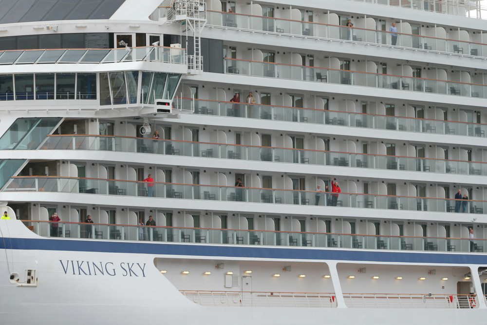Some of the remaining passengers look out as the cruise ship Viking Sky arrives at port off Molde, Norway, Sunday March 24, 2019, after having problems and issuing a Mayday call on Saturday in heavy seas off Norway's western coast. Rescue helicopters took more than 475 passengers from a cruise ship that got stranded off Norway's western coast in bad weather before the vessel departed for a nearby port under escort and with nearly 900 people still on board, the ship's owner said Sunday. (Svein Ove Ekornesvag/NTB scanpix via AP) Some of the remaining passengers look out as the cruise ship Viking Sky arrives at port off Molde, Norway, Sunday March 24, 2019, after having problems and issuing a Mayday call on Saturday in heavy seas off Norway's western coast. Rescue helicopters took more than 475 passengers from a cruise ship that got stranded off Norway's western coast in bad weather before the vessel departed for a nearby port under escort and with nearly 900 people still on board, the ship's owner said Sunday. (Svein Ove Ekornesvag/NTB scanpix via AP)