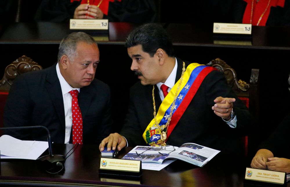 FILE - In this Jan. 24, 2019 file photo, Venezuelan President Nicolas Maduro, right, speaks with Constitutional Assembly President Diosdado Cabello at the Supreme Court during an annual ceremony that marks the start of the judicial year in Caracas, Venezuela. The U.S. has opened up secret communications with Cabello as members of Maduro’s inner circle seek guarantees they won’t face retribution if they cede to growing demands to remove him, a senior administration official told The Associated Press on Saturday, Aug. 17, 2019. (AP Photo/Ariana Cubillos, File) FILE - In this Jan. 24, 2019 file photo, Venezuelan President Nicolas Maduro, right, speaks with Constitutional Assembly President Diosdado Cabello at the Supreme Court during an annual ceremony that marks the start of the judicial year in Caracas, Venezuela. The U.S. has opened up secret communications with Cabello as members of Maduro’s inner circle seek guarantees they won’t face retribution if they cede to growing demands to remove him, a senior administration official told The Associated Press on Saturday, Aug. 17, 2019. (AP Photo/Ariana Cubillos, File)