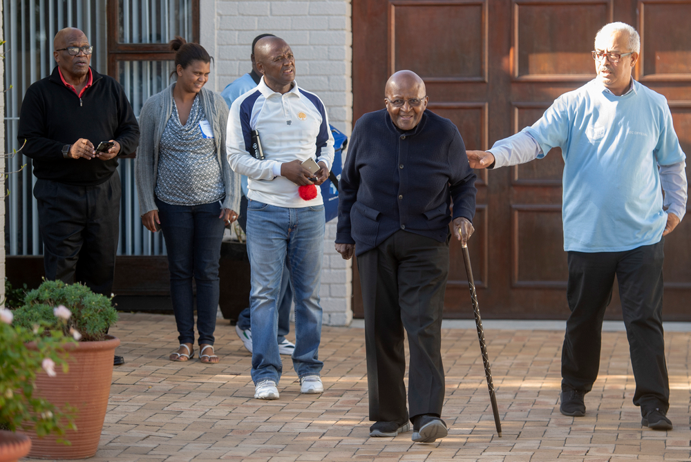 Anglican Archbishop Desmond Tutu exits his home after casting his special vote, near Cape Town, South Africa, Monday May 6, 2019. Tutu, 87, is in fragile health and took part in South Africa's special voting for the elderly and infirm where electoral officials go to their homes or care facilities before the actual voting day of May 8. (AP Photo) Anglican Archbishop Desmond Tutu exits his home after casting his special vote, near Cape Town, South Africa, Monday May 6, 2019. Tutu, 87, is in fragile health and took part in South Africa's special voting for the elderly and infirm where electoral officials go to their homes or care facilities before the actual voting day of May 8. (AP Photo)