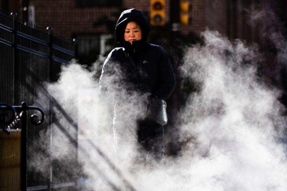 A woman bundled up against the cold walks on an autumn morning in Philadelphia, Wednesday, Nov. 13, 2019. An arctic blast that sent shivers across the Midwest spread to the eastern U.S. on Wednesday, with bitter weather establishing new records from Mississippi to Maine. (AP Photo/Matt Rourke) A woman bundled up against the cold walks on an autumn morning in Philadelphia, Wednesday, Nov. 13, 2019. An arctic blast that sent shivers across the Midwest spread to the eastern U.S. on Wednesday, with bitter weather establishing new records from Mississippi to Maine. (AP Photo/Matt Rourke)