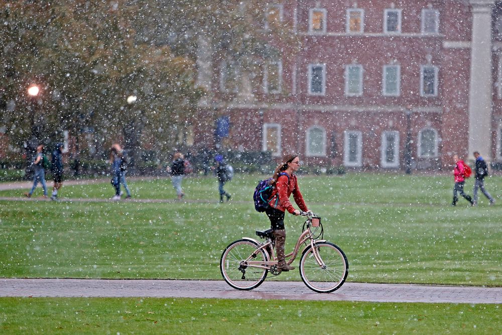 Christopher Newport University students make their way through campus as snow falls, Tuesday afternoon, Nov. 12, 2019 in Newport News, Va. (Jonathon Gruenke/The Virginian-Pilot via AP) Christopher Newport University students make their way through campus as snow falls, Tuesday afternoon, Nov. 12, 2019 in Newport News, Va. (Jonathon Gruenke/The Virginian-Pilot via AP)