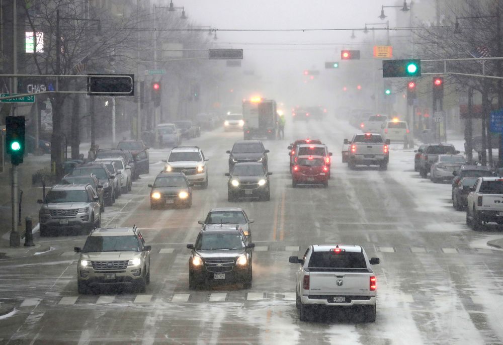 Traffic moves slowly along College Avenue as snow falls Wednesday, Nov. 13, 2019, in Appleton, Wis. (Dan Powers/The Post-Crescent via AP) Traffic moves slowly along College Avenue as snow falls Wednesday, Nov. 13, 2019, in Appleton, Wis. (Dan Powers/The Post-Crescent via AP)