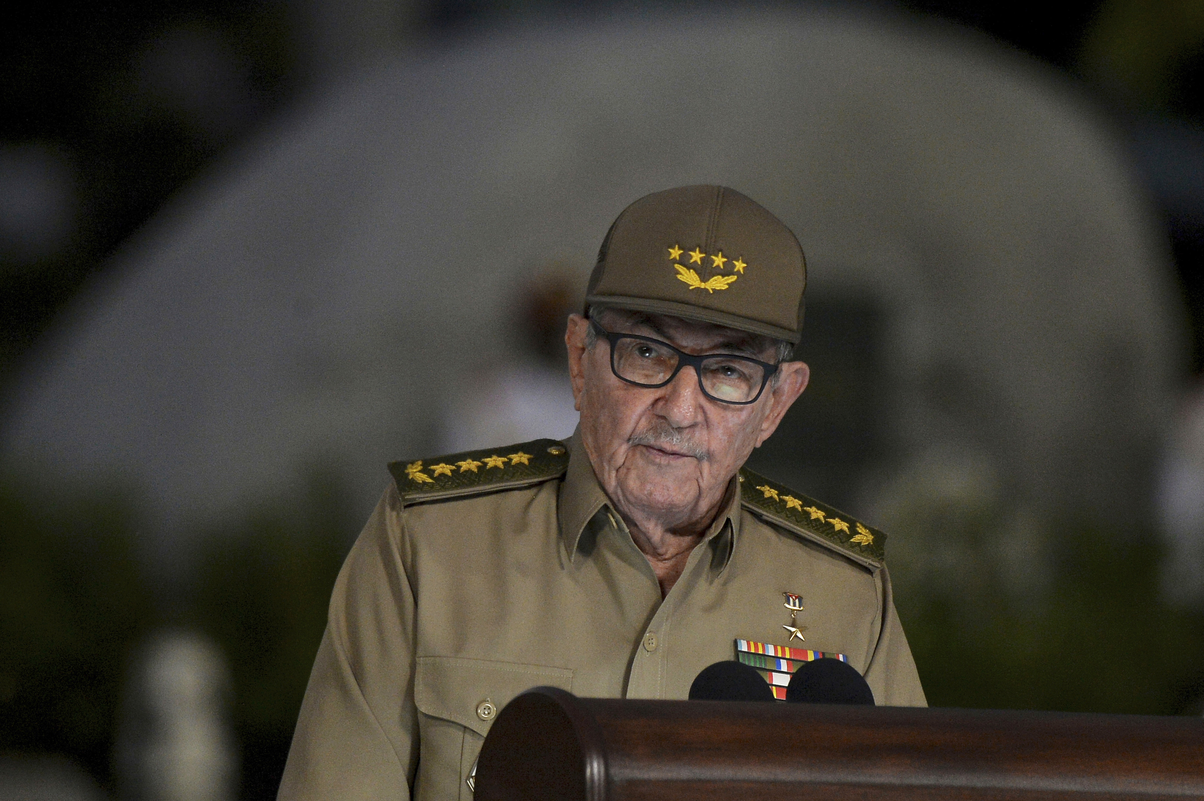 FILE - In this Jan. 1, 2019 file photo, Cuba's First Secretary of Communist Party Raul Castro gives a speech during the celebration of 60th Anniversary of Cuban Revolution, in Santiago de Cuba, Cuba. Castro warned Cubans on Wednesday, April 10, 2019, to brace for shortages and other economic problems due to Trump administration policies, but says the island won’t repeat the extreme deprivation of the post-Soviet period, in his first speech to the nation in more than three months. (AP Photo/Yamil Lage, File) FILE - In this Jan. 1, 2019 file photo, Cuba's First Secretary of Communist Party Raul Castro gives a speech during the celebration of 60th Anniversary of Cuban Revolution, in Santiago de Cuba, Cuba. Castro warned Cubans on Wednesday, April 10, 2019, to brace for shortages and other economic problems due to Trump administration policies, but says the island won’t repeat the extreme deprivation of the post-Soviet period, in his first speech to the nation in more than three months. (AP Photo/Yamil Lage, File)