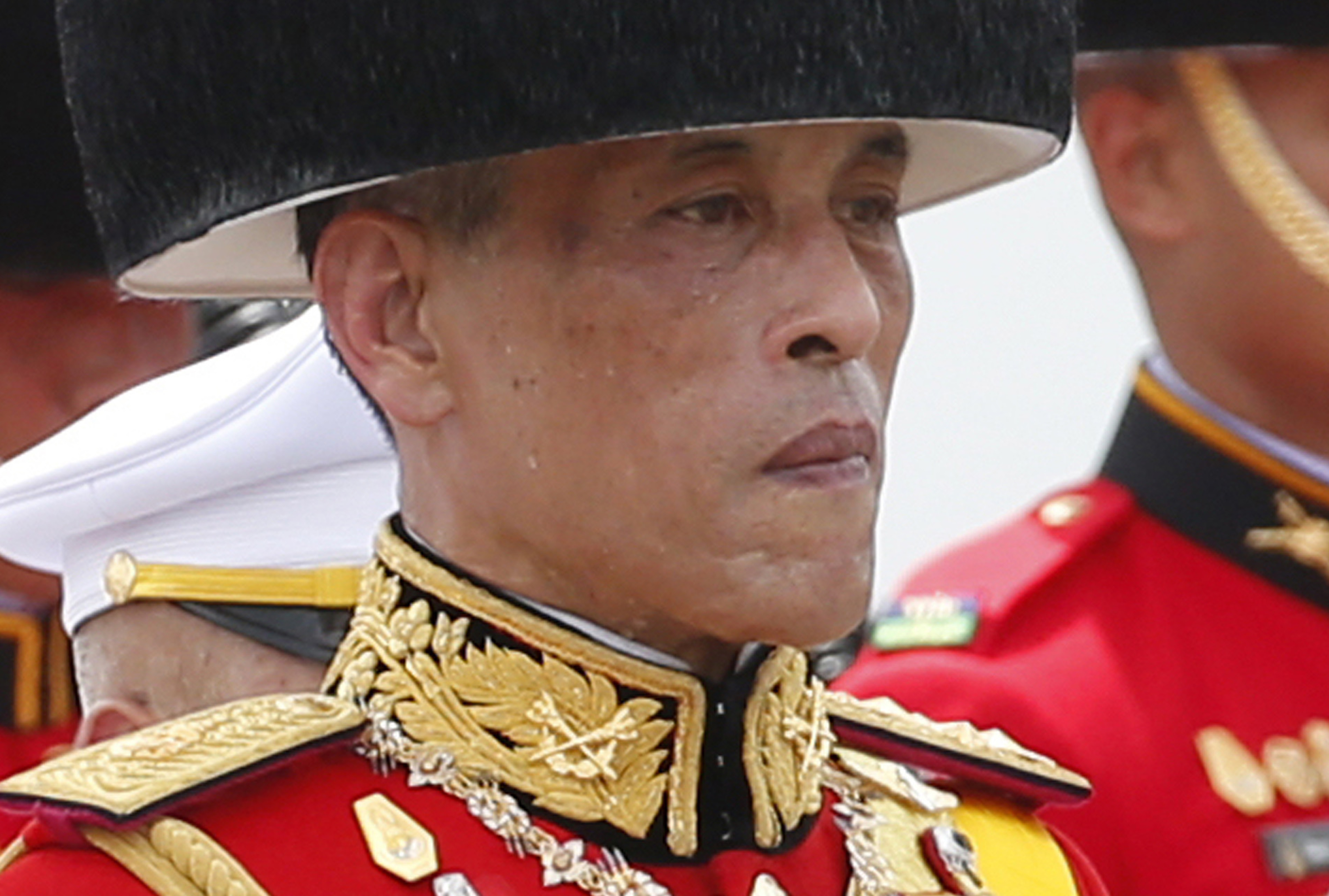 FILE - In this Oct. 26, 2017, file photo, Thailand's King Maha Vajiralongkorn walks in a funeral procession of his father the late King Bhumibol Adulyadej in Bangkok, Thailand. Late Friday, Feb. 8, 2019, King Vajiralongkorn issued a decree stating that no member of the royal family should be involved in politics, quashing a bid by his older sister to run for prime minister in next month's elections. (AP Photo/Sakchai Lalit, File) FILE - In this Oct. 26, 2017, file photo, Thailand's King Maha Vajiralongkorn walks in a funeral procession of his father the late King Bhumibol Adulyadej in Bangkok, Thailand. Late Friday, Feb. 8, 2019, King Vajiralongkorn issued a decree stating that no member of the royal family should be involved in politics, quashing a bid by his older sister to run for prime minister in next month's elections. (AP Photo/Sakchai Lalit, File)