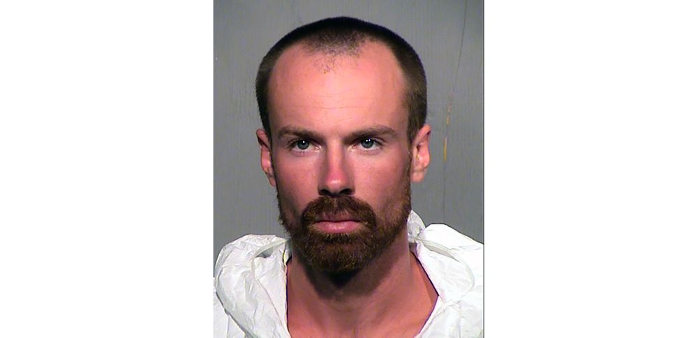 This undated booking photo provided by the Maricopa County Sheriff Office shows 27-year-old Michael Adams who has been arrested on suspicion of first-degree murder. Adams who was recently released from prison was arrested in the fatal stabbing of a 17-year-old boy found face down by fuel pumps at a metro Phoenix convenience store. (Maricopa County Sheriff Office via AP) This undated booking photo provided by the Maricopa County Sheriff Office shows 27-year-old Michael Adams who has been arrested on suspicion of first-degree murder. Adams who was recently released from prison was arrested in the fatal stabbing of a 17-year-old boy found face down by fuel pumps at a metro Phoenix convenience store. (Maricopa County Sheriff Office via AP)