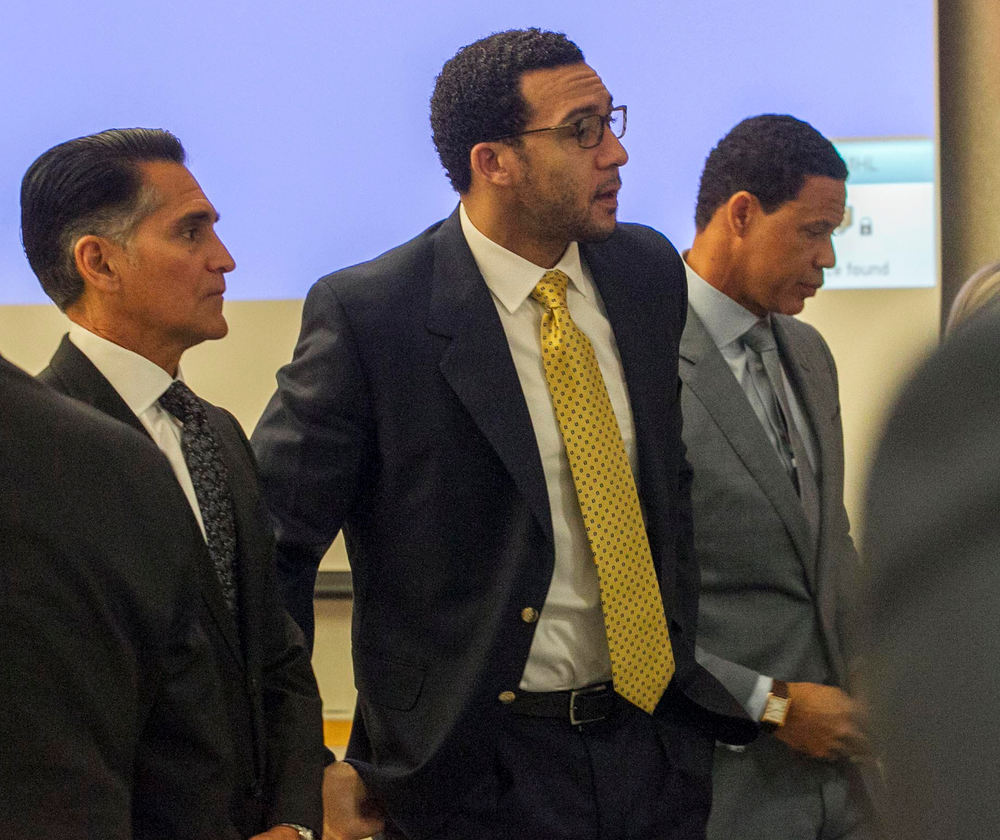 Former NFL football player Kellen Winslow Jr., center, stands as the jury enters the courtroom on the first day of his rape trial, Monday May 20, 2019, in Vista, Calif. Winslow's attorneys Brian Watkins, right, and Marc Carlo, left, flank him. (John Gibbins/The San Diego Union-Tribune via AP, Pool) Former NFL football player Kellen Winslow Jr., center, stands as the jury enters the courtroom on the first day of his rape trial, Monday May 20, 2019, in Vista, Calif. Winslow's attorneys Brian Watkins, right, and Marc Carlo, left, flank him. (John Gibbins/The San Diego Union-Tribune via AP, Pool)