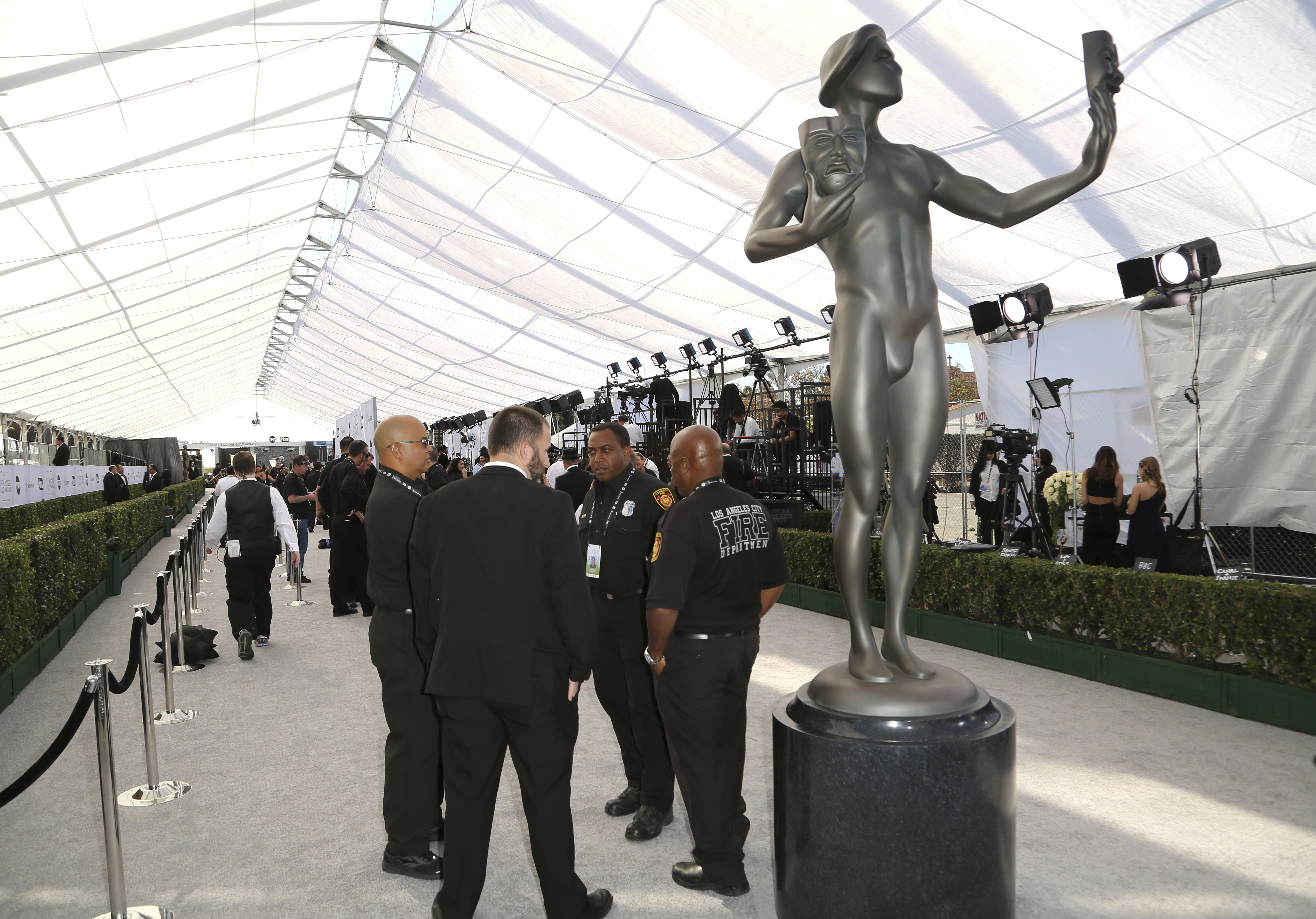 Security gathers around an Actor statue on the red carpet at the 25th annual Screen Actors Guild Awards at the Shrine Auditorium & Expo Hall on Sunday, Jan. 27, 2019, in Los Angeles. (Photo by Willy Sanjuan/Invision/AP) Security gathers around an Actor statue on the red carpet at the 25th annual Screen Actors Guild Awards at the Shrine Auditorium & Expo Hall on Sunday, Jan. 27, 2019, in Los Angeles. (Photo by Willy Sanjuan/Invision/AP)