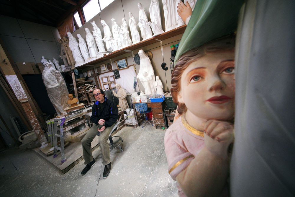 In this Nov. 16, 2019, photo, Mitsuho Nakata, a Catholic statue artist, speaks during an interview at his workshop near the Urakami Cathedral in Nagasaki, southern Japan. Pope Francis will start his first official visit to Japan in Nagasaki, ground zero for the Christian experience in a nation where the Catholic leader once dreamed of living as a missionary. (AP Photo/Eugene Hoshiko) In this Nov. 16, 2019, photo, Mitsuho Nakata, a Catholic statue artist, speaks during an interview at his workshop near the Urakami Cathedral in Nagasaki, southern Japan. Pope Francis will start his first official visit to Japan in Nagasaki, ground zero for the Christian experience in a nation where the Catholic leader once dreamed of living as a missionary. (AP Photo/Eugene Hoshiko)