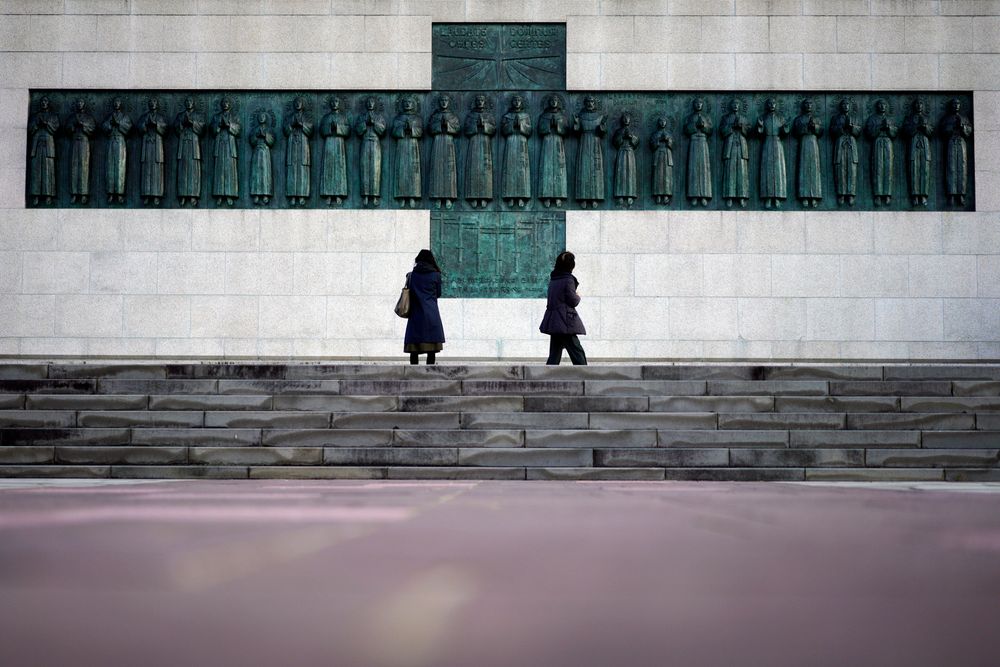 In this Nov. 17, 2019, photo, people visit the Twenty-Six Martyrs Monument in Nagasaki, southern Japan. Pope Francis will start his first official visit to Japan in Nagasaki, ground zero for the Christian experience in a nation where the Catholic leader once dreamed of living as a missionary. (AP Photo/Eugene Hoshiko) In this Nov. 17, 2019, photo, people visit the Twenty-Six Martyrs Monument in Nagasaki, southern Japan. Pope Francis will start his first official visit to Japan in Nagasaki, ground zero for the Christian experience in a nation where the Catholic leader once dreamed of living as a missionary. (AP Photo/Eugene Hoshiko)