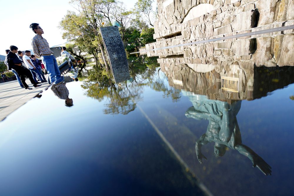 In this Nov. 16, 2019, photo, the Statue of Peace is reflected on water fountain at the Peace Park in Nagasaki, southern Japan. Pope Francis will start his first official visit to Japan in Nagasaki, ground zero for the Christian experience in a nation where the Catholic leader once dreamed of living as a missionary. (AP Photo/Eugene Hoshiko) In this Nov. 16, 2019, photo, the Statue of Peace is reflected on water fountain at the Peace Park in Nagasaki, southern Japan. Pope Francis will start his first official visit to Japan in Nagasaki, ground zero for the Christian experience in a nation where the Catholic leader once dreamed of living as a missionary. (AP Photo/Eugene Hoshiko)