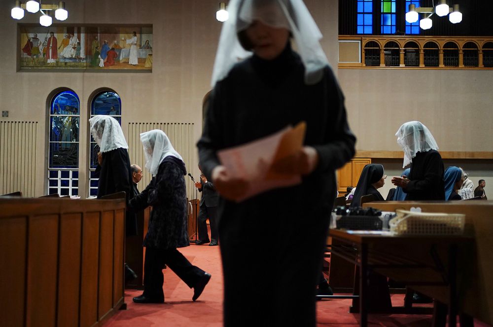 In this Nov. 17, 2019, photo, Catholics attend an early morning Mass at the Urakami Cathedral in Nagasaki, southern Japan. Pope Francis will start his first official visit to Japan in Nagasaki, ground zero for the Christian experience in a nation where the Catholic leader once dreamed of living as a missionary. (AP Photo/Eugene Hoshiko) In this Nov. 17, 2019, photo, Catholics attend an early morning Mass at the Urakami Cathedral in Nagasaki, southern Japan. Pope Francis will start his first official visit to Japan in Nagasaki, ground zero for the Christian experience in a nation where the Catholic leader once dreamed of living as a missionary. (AP Photo/Eugene Hoshiko)