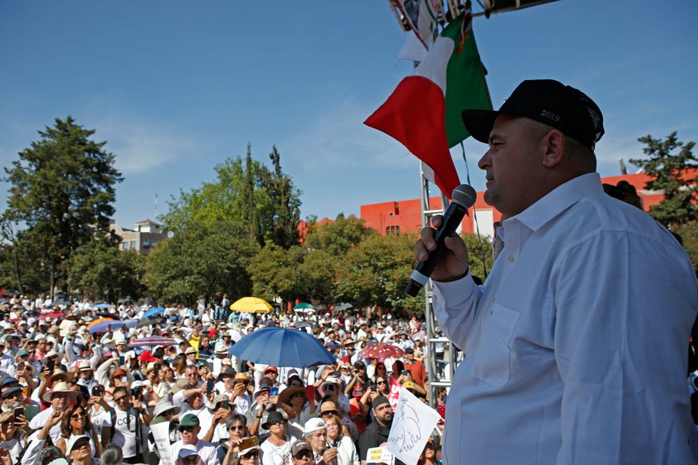 Julian LeBaron speaks during a protest against the first year in office of Mexico's President Andres Manuel Lopez Obrador, in Mexico City, Monday, Dec. 1, 2019. LeBaron joined a protest on Reforma avenue to expressed anger and frustration over increasingly appalling incidents of violence, a stagnant economy and deepening political divisions in the country. (AP Photo/Ginnette Riquelme) Julian LeBaron speaks during a protest against the first year in office of Mexico's President Andres Manuel Lopez Obrador, in Mexico City, Monday, Dec. 1, 2019. LeBaron joined a protest on Reforma avenue to expressed anger and frustration over increasingly appalling incidents of violence, a stagnant economy and deepening political divisions in the country. (AP Photo/Ginnette Riquelme)