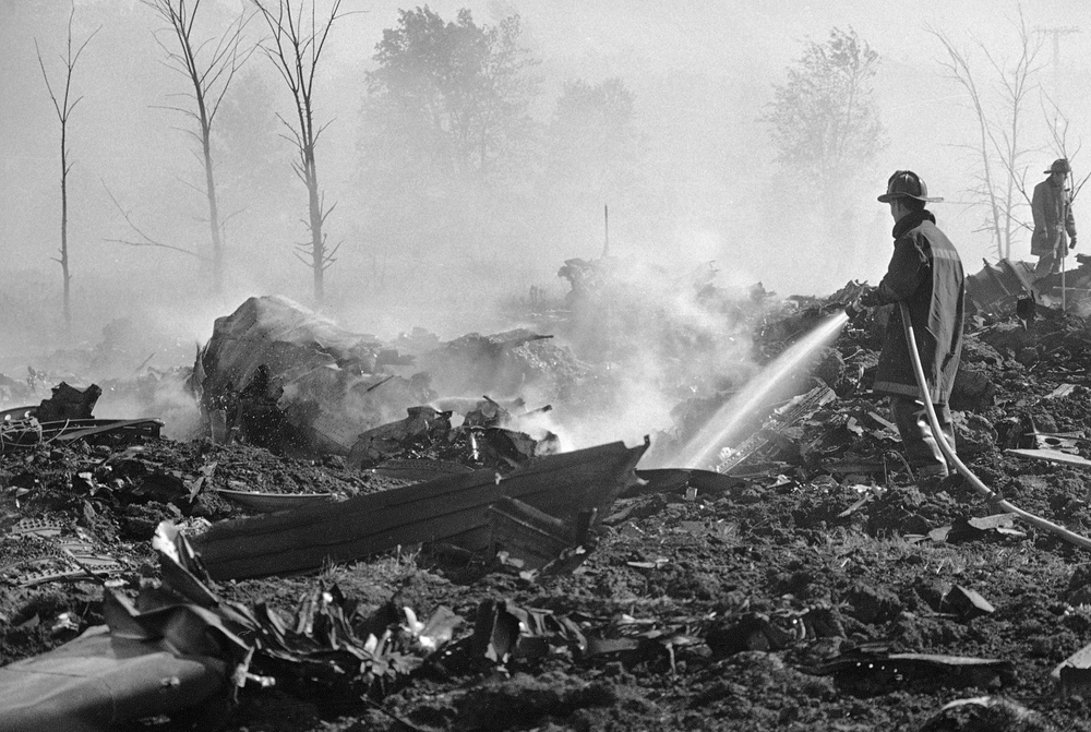 FILE - In this May 25, 1979 file photo, a fireman hoses down twisted remains of an American Airlines DC-10 which crashed and exploded on takeoff from O'Hare International Airport, in Chicago. Decades later, the crash of American Airlines Flight 191 moments after it took off from Chicago's O'Hare International Airport remains the deadliest aviation accident in U.S. history. The DC-10 was destined for Los Angeles when it lost one of its engines killing what investigators later determined were 273 people _ all 271 people aboard the jetliner and two people on the ground. (AP Photo/Fred Jewell File) FILE - In this May 25, 1979 file photo, a fireman hoses down twisted remains of an American Airlines DC-10 which crashed and exploded on takeoff from O'Hare International Airport, in Chicago. Decades later, the crash of American Airlines Flight 191 moments after it took off from Chicago's O'Hare International Airport remains the deadliest aviation accident in U.S. history. The DC-10 was destined for Los Angeles when it lost one of its engines killing what investigators later determined were 273 people _ all 271 people aboard the jetliner and two people on the ground. (AP Photo/Fred Jewell File)