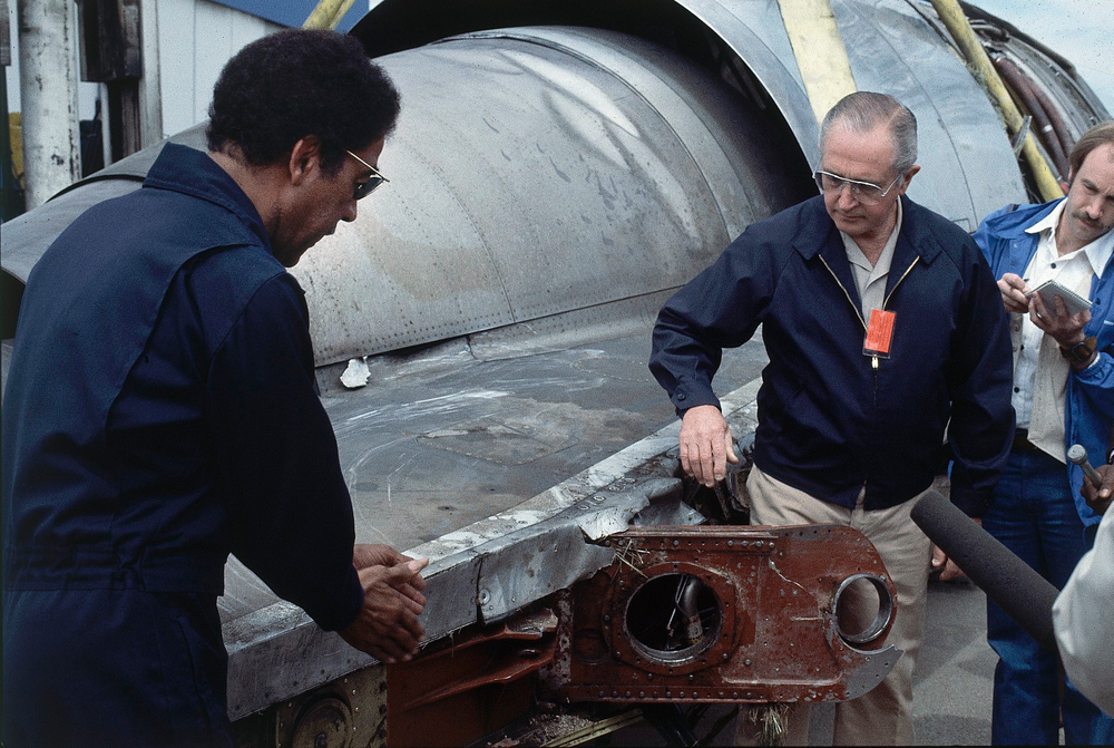 FILE - In this May 26, 1979 photo, William Schaefer of American Airlines, right, and Elwood Driver of the National Transportation Safety Board, left, examine the engine that fell off the DC-10 in Chicago, Ill., Decades later, the crash of American Airlines Flight 191 moments after it took off from O'Hare International Airport remains the deadliest aviation accident in U.S. history. The DC-10 was destined for Los Angeles when it lost one of its engines May 25, 1979, killing what investigators later determined were 273 people _ all 271 people aboard the jetliner and two people on the ground. (AP Photo/Fred Jewell File) FILE - In this May 26, 1979 photo, William Schaefer of American Airlines, right, and Elwood Driver of the National Transportation Safety Board, left, examine the engine that fell off the DC-10 in Chicago, Ill., Decades later, the crash of American Airlines Flight 191 moments after it took off from O'Hare International Airport remains the deadliest aviation accident in U.S. history. The DC-10 was destined for Los Angeles when it lost one of its engines May 25, 1979, killing what investigators later determined were 273 people _ all 271 people aboard the jetliner and two people on the ground. (AP Photo/Fred Jewell File)