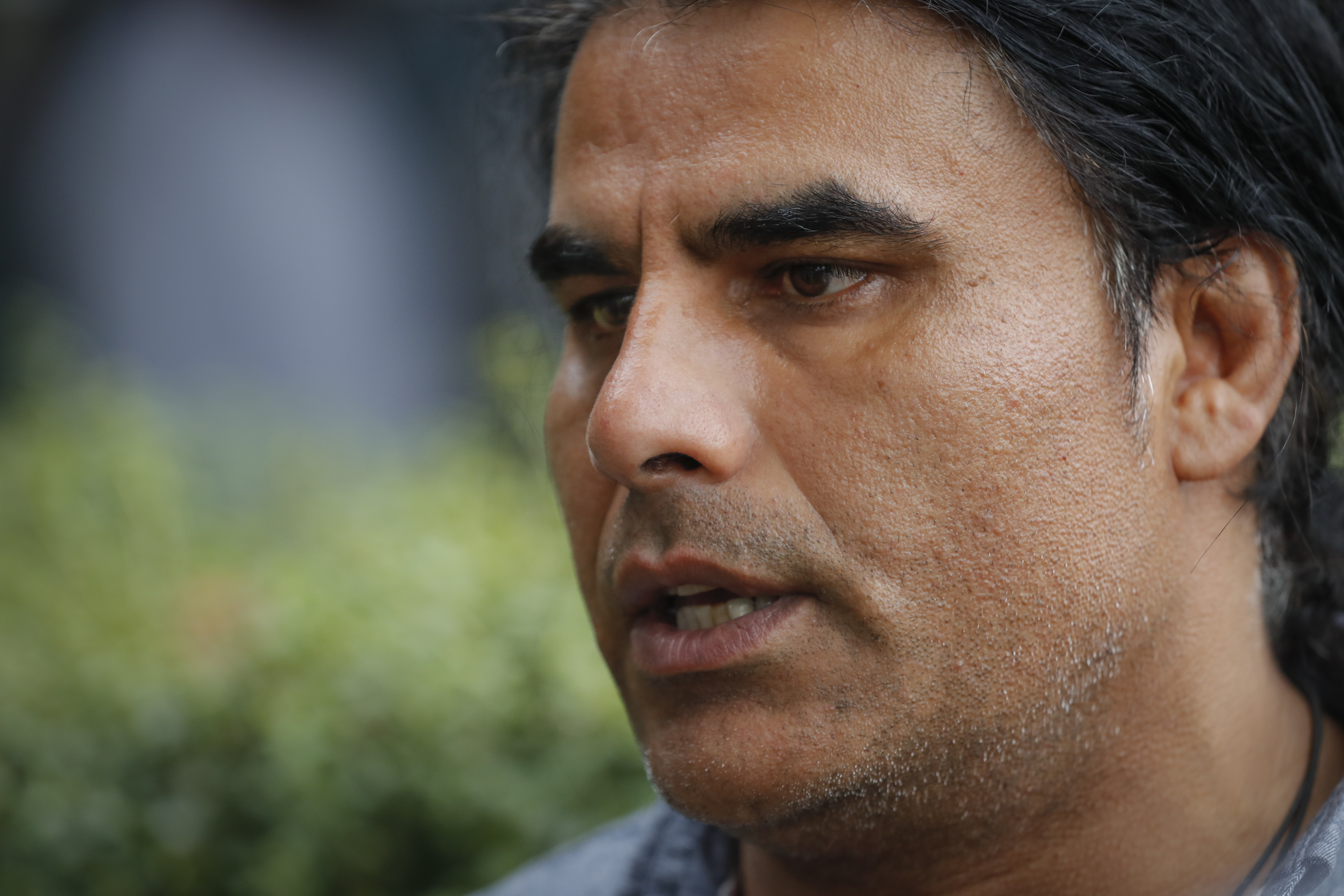 FILE - In this March 16, 2019, file photo, Abdul Aziz, survivor of mosque shooting speaks to Associated Press during an interview in Christchurch, New Zealand. Aziz is being hailed as a hero for preventing more deaths during Friday prayers at the Linwood mosque in Christchurch. (AP Photo/Vincent Thian, File) FILE - In this March 16, 2019, file photo, Abdul Aziz, survivor of mosque shooting speaks to Associated Press during an interview in Christchurch, New Zealand. Aziz is being hailed as a hero for preventing more deaths during Friday prayers at the Linwood mosque in Christchurch. (AP Photo/Vincent Thian, File)