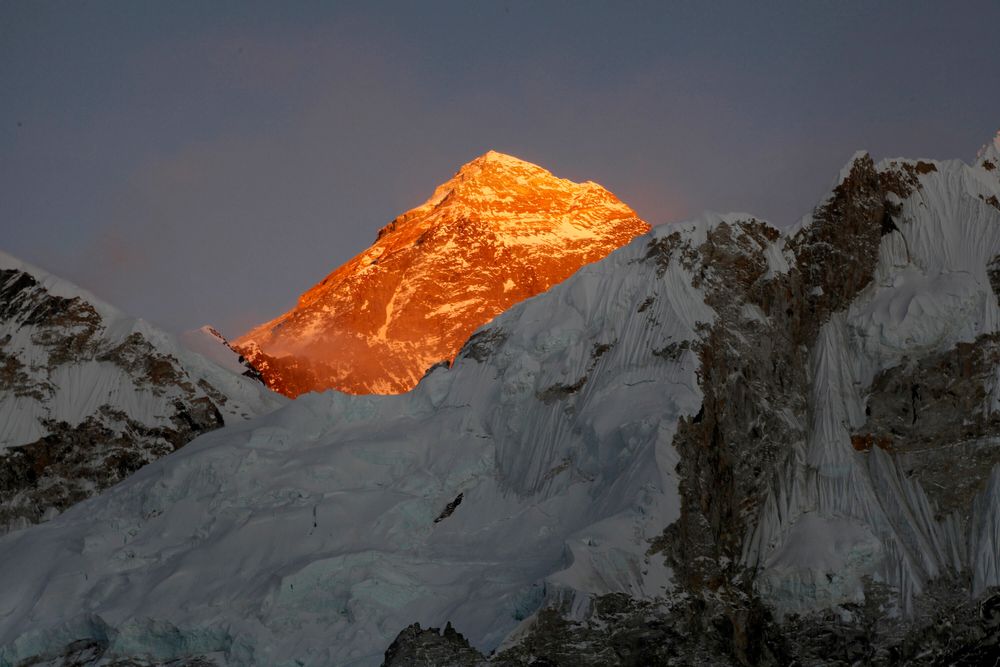 FILE - In this Nov. 12, 2015, file photo, Mt. Everest is seen from the way to Kalapatthar in Nepal. Nepal mountaineering authorities have determined that an Indian couple faked a Mount Everest ascent earlier this year by altering photographs to show they were on the summit. A Nepalese national has shattered the previous mountaineering record for successfully climbing the world’s 14 highest peaks, completing the feat in 189 days. (AP Photo/Tashi Sherpa, File) FILE - In this Nov. 12, 2015, file photo, Mt. Everest is seen from the way to Kalapatthar in Nepal. Nepal mountaineering authorities have determined that an Indian couple faked a Mount Everest ascent earlier this year by altering photographs to show they were on the summit. A Nepalese national has shattered the previous mountaineering record for successfully climbing the world’s 14 highest peaks, completing the feat in 189 days. (AP Photo/Tashi Sherpa, File)