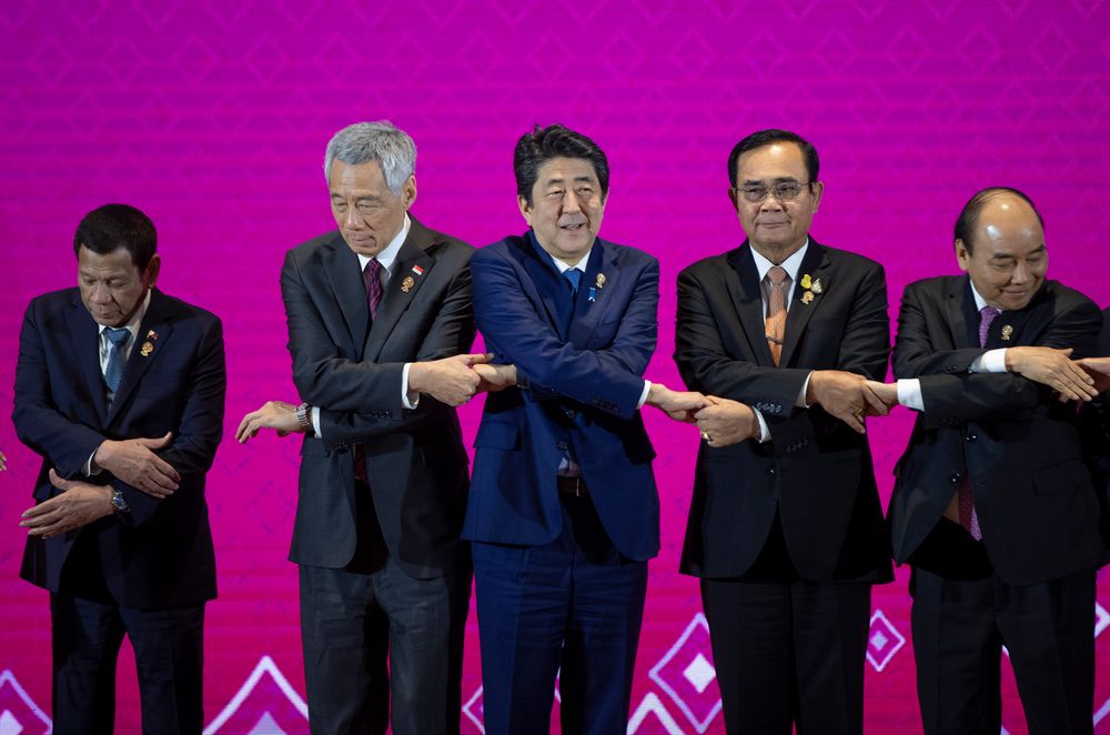 Japan Prime Minister Shinzo Abe, center, poses for a group photo with leaders of ASEAN, from left; Philippines President Rodrigo Duterte, Singapore Prime Minister Lee Hsien Loong, Thailand Prime Minister Prayuth Chan-ocha, and Vietnam Prime Minister Nguyen Xuan Phuc during ASEAN-Japan summit in Nonthaburi, Thailand, Monday, Nov. 4, 2019. (AP Photo/Gemunu Amarasinghe ) Japan Prime Minister Shinzo Abe, center, poses for a group photo with leaders of ASEAN, from left; Philippines President Rodrigo Duterte, Singapore Prime Minister Lee Hsien Loong, Thailand Prime Minister Prayuth Chan-ocha, and Vietnam Prime Minister Nguyen Xuan Phuc during ASEAN-Japan summit in Nonthaburi, Thailand, Monday, Nov. 4, 2019. (AP Photo/Gemunu Amarasinghe )