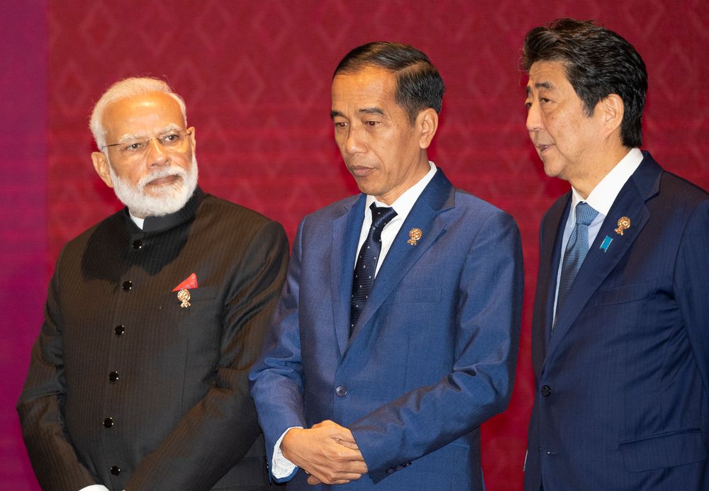 From Left to Right; India's Prime Minister Narendra Modi, Indonesia's President Joko Widodo, and Japan's Prime Minister Shinzo Abe talk before a group photo during the East Asia summit in Nonthaburi, Thailand, Monday, Nov. 4, 2019. (AP Photo/Sakchai Lalit) From Left to Right; India's Prime Minister Narendra Modi, Indonesia's President Joko Widodo, and Japan's Prime Minister Shinzo Abe talk before a group photo during the East Asia summit in Nonthaburi, Thailand, Monday, Nov. 4, 2019. (AP Photo/Sakchai Lalit)