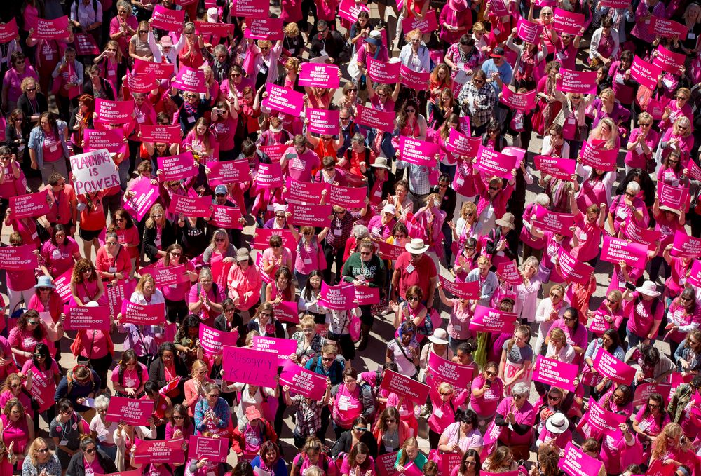 FILE - In this Wednesday, April 5, 2017 file photo, demonstrators participate in a rally for Planned Parenthood at the Capitol in Austin, Texas. Abortion advocates say Texas' capital of Austin has become the first city in the nation to provide funding toward logistical services for abortion access. (Jay Janner/Austin American-Statesman via AP, File)/Austin American-Statesman via AP) FILE - In this Wednesday, April 5, 2017 file photo, demonstrators participate in a rally for Planned Parenthood at the Capitol in Austin, Texas. Abortion advocates say Texas' capital of Austin has become the first city in the nation to provide funding toward logistical services for abortion access. (Jay Janner/Austin American-Statesman via AP, File)/Austin American-Statesman via AP)