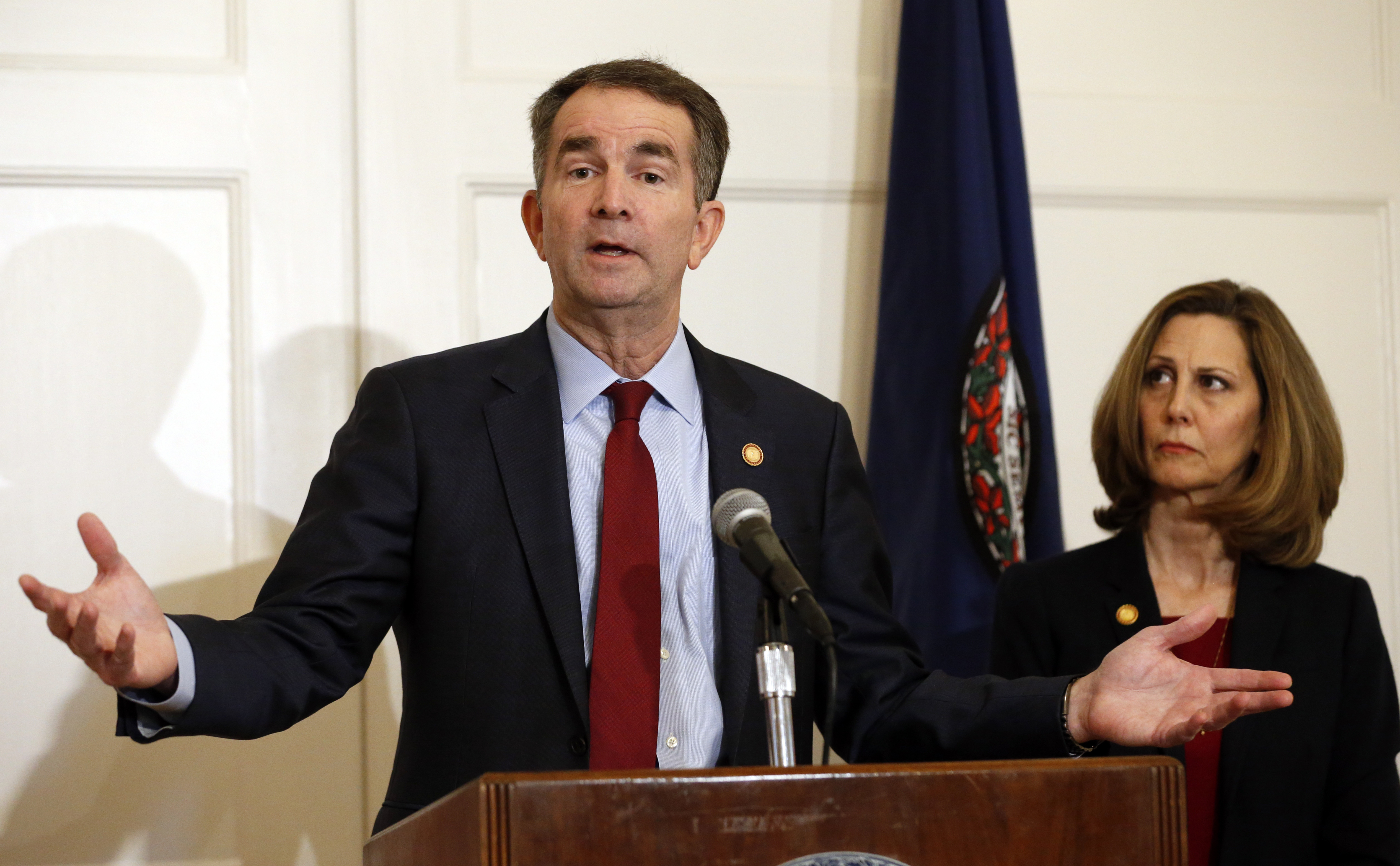 In this Feb. 2, 2019, photo, Virginia Gov. Ralph Northam, left, accompanied by his wife, Pam, speaks during a news conference in the governor's mansion in Richmond, Va. Democrats are hoping there’s a silver lining to the Northam mess - that it shows they won’t tolerate racism. Every level of the party has condemned the Democratic Virginia governor and demanded he step down. That follows disclosure that his medical school yearbook page features photos of a man in blackface standing with someone dressed in Klu Klux Klan attire.(AP Photo/Steve Helber) In this Feb. 2, 2019, photo, Virginia Gov. Ralph Northam, left, accompanied by his wife, Pam, speaks during a news conference in the governor's mansion in Richmond, Va. Democrats are hoping there’s a silver lining to the Northam mess - that it shows they won’t tolerate racism. Every level of the party has condemned the Democratic Virginia governor and demanded he step down. That follows disclosure that his medical school yearbook page features photos of a man in blackface standing with someone dressed in Klu Klux Klan attire.(AP Photo/Steve Helber)