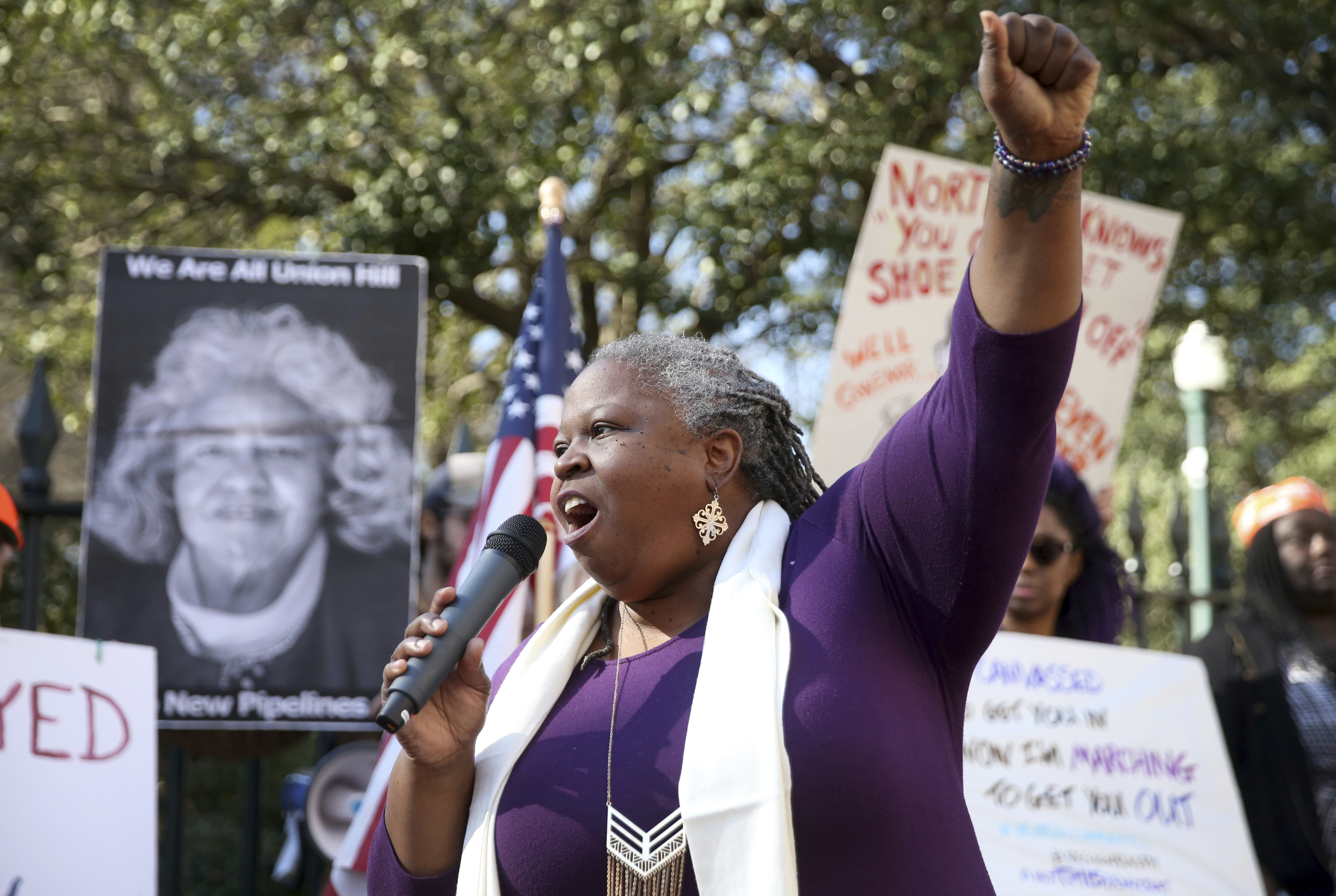 Pastor Lacette Cross, of Restoration Fellowship RVA, speaks during a protest calling for Governor Ralph Northam to resign on Monday Feb. 4, 2019. Northam has rebuffed widespread calls for his resignation after a racist photo surfaced Friday in his 1984 medical school yearbook page. (Shelby Lum/Richmond Times-Dispatch via AP) Pastor Lacette Cross, of Restoration Fellowship RVA, speaks during a protest calling for Governor Ralph Northam to resign on Monday Feb. 4, 2019. Northam has rebuffed widespread calls for his resignation after a racist photo surfaced Friday in his 1984 medical school yearbook page. (Shelby Lum/Richmond Times-Dispatch via AP)