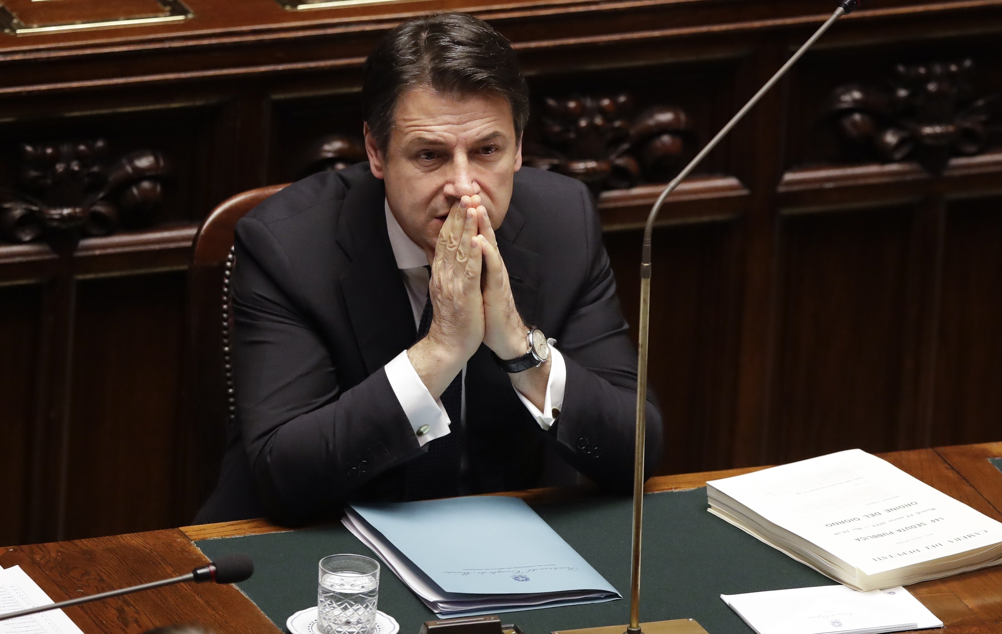 Italian Premier Giuseppe Conte sits before addressing the Lower Chamber of the Italian parliament in Rome, Tuesday, March 19, 2019. (AP Photo/Alessandra Tarantino) Italian Premier Giuseppe Conte sits before addressing the Lower Chamber of the Italian parliament in Rome, Tuesday, March 19, 2019. (AP Photo/Alessandra Tarantino)