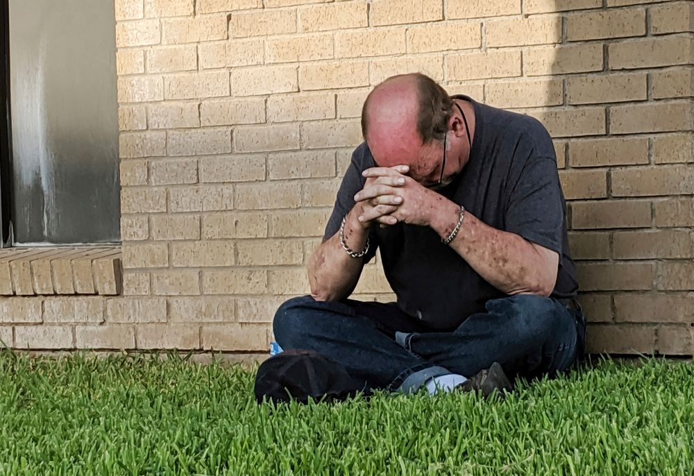 A man prays outside of the Medical Center Hospital Emergency room in Odessa, Texas, Saturday, Aug. 31, 2019, following a shooting at random in the area of Odessa and Midland. Several people were dead after a gunman who hijacked a postal service vehicle in West Texas shot more than 20 people, authorities said Saturday. The gunman was killed and a few law enforcement officers were among the injured. (Mark Rogers/Odessa American via AP) A man prays outside of the Medical Center Hospital Emergency room in Odessa, Texas, Saturday, Aug. 31, 2019, following a shooting at random in the area of Odessa and Midland. Several people were dead after a gunman who hijacked a postal service vehicle in West Texas shot more than 20 people, authorities said Saturday. The gunman was killed and a few law enforcement officers were among the injured. (Mark Rogers/Odessa American via AP)