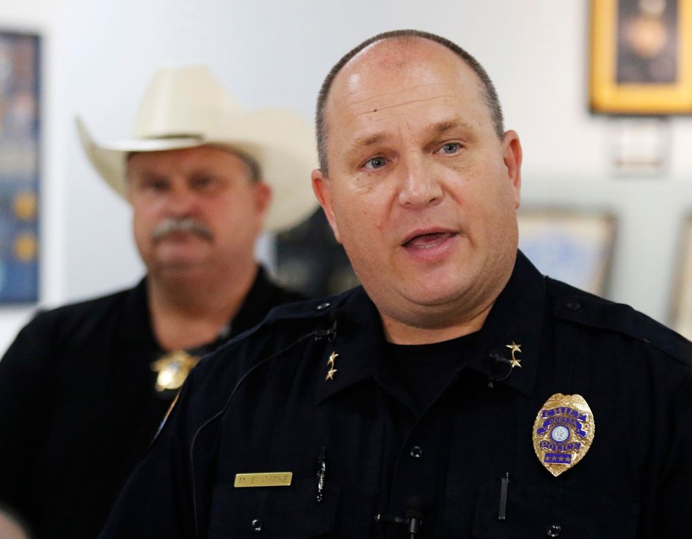Odessa Police Chief Michael Gerke talks to the media in the Odessa Police Department in Odessa, Texas, Saturday, Aug. 31, 2019, following a shooting at random in the area of Odessa and Midland. Several people were dead after a gunman who hijacked a postal service vehicle in West Texas shot more than 20 people, authorities said Saturday. The gunman was killed and a few law enforcement officers were among the injured. (Mark Rogers/Odessa American via AP) Odessa Police Chief Michael Gerke talks to the media in the Odessa Police Department in Odessa, Texas, Saturday, Aug. 31, 2019, following a shooting at random in the area of Odessa and Midland. Several people were dead after a gunman who hijacked a postal service vehicle in West Texas shot more than 20 people, authorities said Saturday. The gunman was killed and a few law enforcement officers were among the injured. (Mark Rogers/Odessa American via AP)