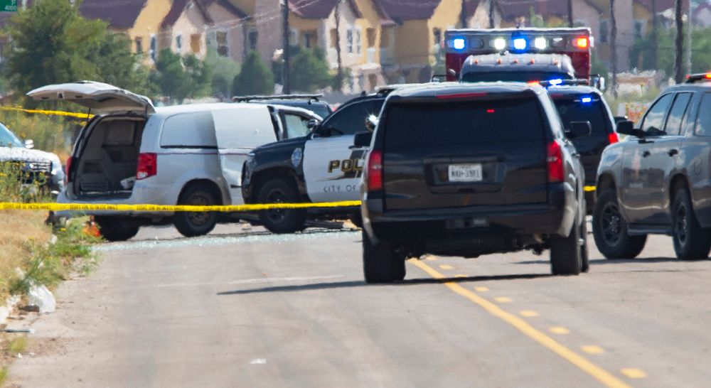 CORRECTS THE NAME OF THE SOURCE TO THE MIDLAND REPORTER-TELEGRAM - Odessa and Midland police and sheriff's deputies surround a white van in Odessa, Texas, Saturday, Aug. 31, 2019, after reports of gunfire. Police said there are CORRECTS THE NAME OF THE SOURCE TO THE MIDLAND REPORTER-TELEGRAM - Odessa and Midland police and sheriff's deputies surround a white van in Odessa, Texas, Saturday, Aug. 31, 2019, after reports of gunfire. Police said there are