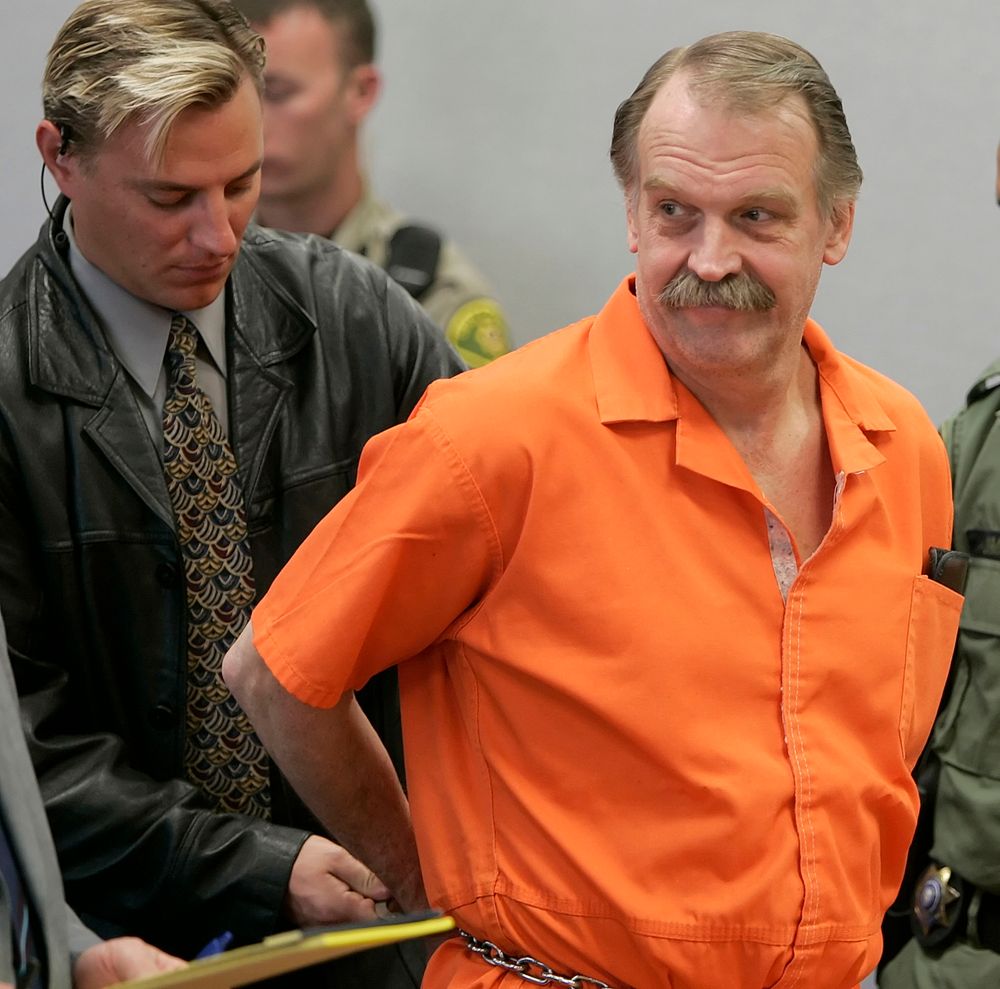 FILE - In this Oct. 6, 2005 file photo, convicted murderer and death row inmate Ron Lafferty is handcuffed after his court hearing in a courtroom in Provo, Utah. Utah prison officials said Monday, Nov. 11, 2019, that Lafferty, a death-row inmate whose double-murder case was featured in the book FILE - In this Oct. 6, 2005 file photo, convicted murderer and death row inmate Ron Lafferty is handcuffed after his court hearing in a courtroom in Provo, Utah. Utah prison officials said Monday, Nov. 11, 2019, that Lafferty, a death-row inmate whose double-murder case was featured in the book