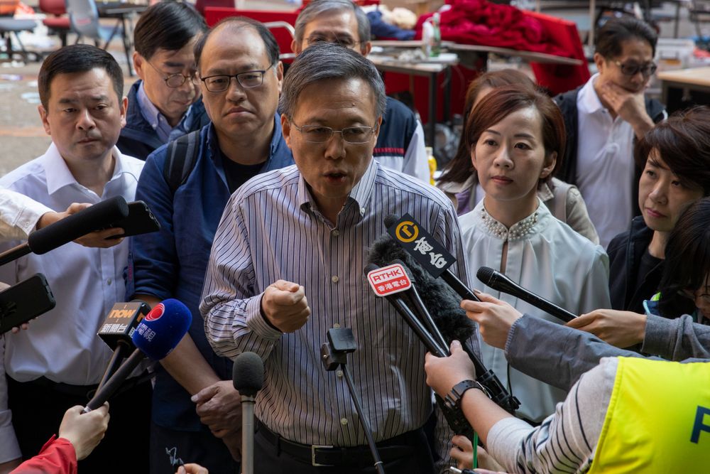 President of the Polytechnic University Jin-Guang Teng speaks to the media at the campus in Hong Kong on Wednesday, Nov. 20, 2019. A small group of protesters refused to leave the Polytechnic University, the remnants of hundreds who took over the campus for several days. They won't leave because they would face arrest. Police have set up a cordon around the area to prevent anyone from escaping. (AP Photo/Ng Han Guan) President of the Polytechnic University Jin-Guang Teng speaks to the media at the campus in Hong Kong on Wednesday, Nov. 20, 2019. A small group of protesters refused to leave the Polytechnic University, the remnants of hundreds who took over the campus for several days. They won't leave because they would face arrest. Police have set up a cordon around the area to prevent anyone from escaping. (AP Photo/Ng Han Guan)