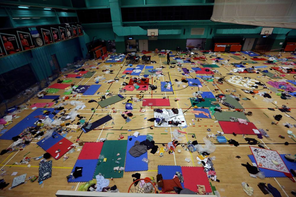 Belonging of protesters are left in the campus of the Polytechnic University in Hong Kong, Wednesday, Nov. 20, 2019. A small group of protesters refused to leave Hong Kong Polytechnic University, the remnants of hundreds who took over the campus for several days. They won't leave because they would face arrest. Police have set up a cordon around the area to prevent anyone from escaping. (AP Photo/Ahmad Ibrahim) Belonging of protesters are left in the campus of the Polytechnic University in Hong Kong, Wednesday, Nov. 20, 2019. A small group of protesters refused to leave Hong Kong Polytechnic University, the remnants of hundreds who took over the campus for several days. They won't leave because they would face arrest. Police have set up a cordon around the area to prevent anyone from escaping. (AP Photo/Ahmad Ibrahim)