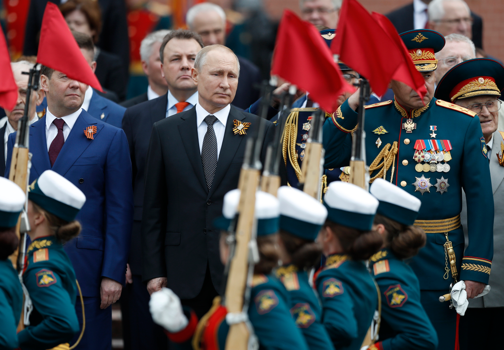Russian President Vladimir Putin, centre, Russian Prime Minister Dmitry Medvedev, left, and Russian Defense Minister Sergei Shoigu, right, attend a wreath-laying ceremony at the Tomb of the Unknown Soldier after the military parade marking 74 years since the victory in WWII in Moscow, Russia, Thursday, May 9, 2019. (AP Photo/Pavel Golovkin) Russian President Vladimir Putin, centre, Russian Prime Minister Dmitry Medvedev, left, and Russian Defense Minister Sergei Shoigu, right, attend a wreath-laying ceremony at the Tomb of the Unknown Soldier after the military parade marking 74 years since the victory in WWII in Moscow, Russia, Thursday, May 9, 2019. (AP Photo/Pavel Golovkin)