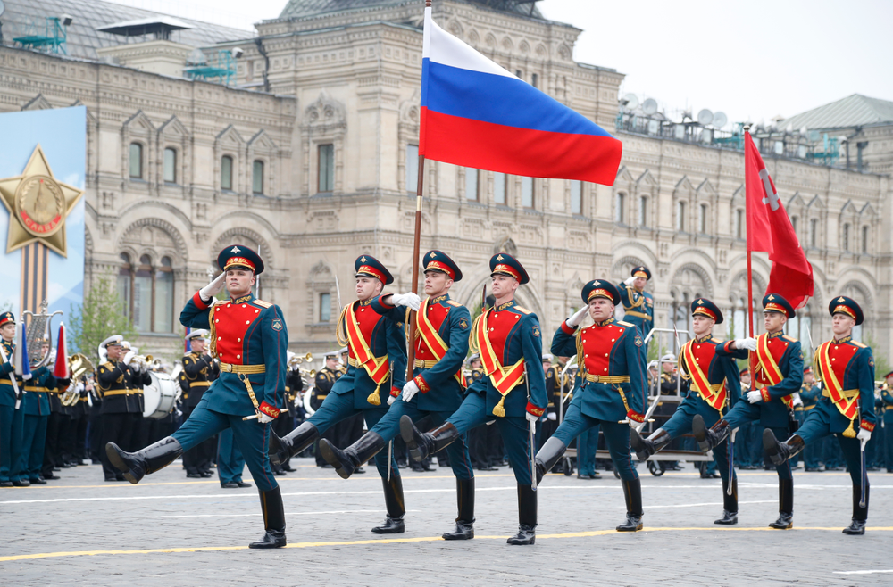 Russian honour guard carry a national flag, left, and a replica of the Victory banner during the military parade to celebrate 74 years since the victory in WWII in Red Square in Moscow, Russia, Thursday, May 9, 2019. (AP Photo/Alexander Zemlianichenko) Russian honour guard carry a national flag, left, and a replica of the Victory banner during the military parade to celebrate 74 years since the victory in WWII in Red Square in Moscow, Russia, Thursday, May 9, 2019. (AP Photo/Alexander Zemlianichenko)