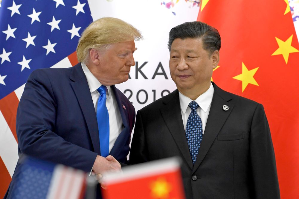 FILE - In this June 29, 2019, file photo, U.S. President Donald Trump, left, shakes hands with Chinese President Xi Jinping during a meeting on the sidelines of the G-20 summit in Osaka, western Japan. Facing another U.S. tariff hike, Xi is getting tougher with Washington instead of backing down. Both sides have incentives to settle a trade war that is battering exporters on either side of the Pacific and threatening to tip the global economy into recession. (AP Photo/Susan Walsh, File) FILE - In this June 29, 2019, file photo, U.S. President Donald Trump, left, shakes hands with Chinese President Xi Jinping during a meeting on the sidelines of the G-20 summit in Osaka, western Japan. Facing another U.S. tariff hike, Xi is getting tougher with Washington instead of backing down. Both sides have incentives to settle a trade war that is battering exporters on either side of the Pacific and threatening to tip the global economy into recession. (AP Photo/Susan Walsh, File)