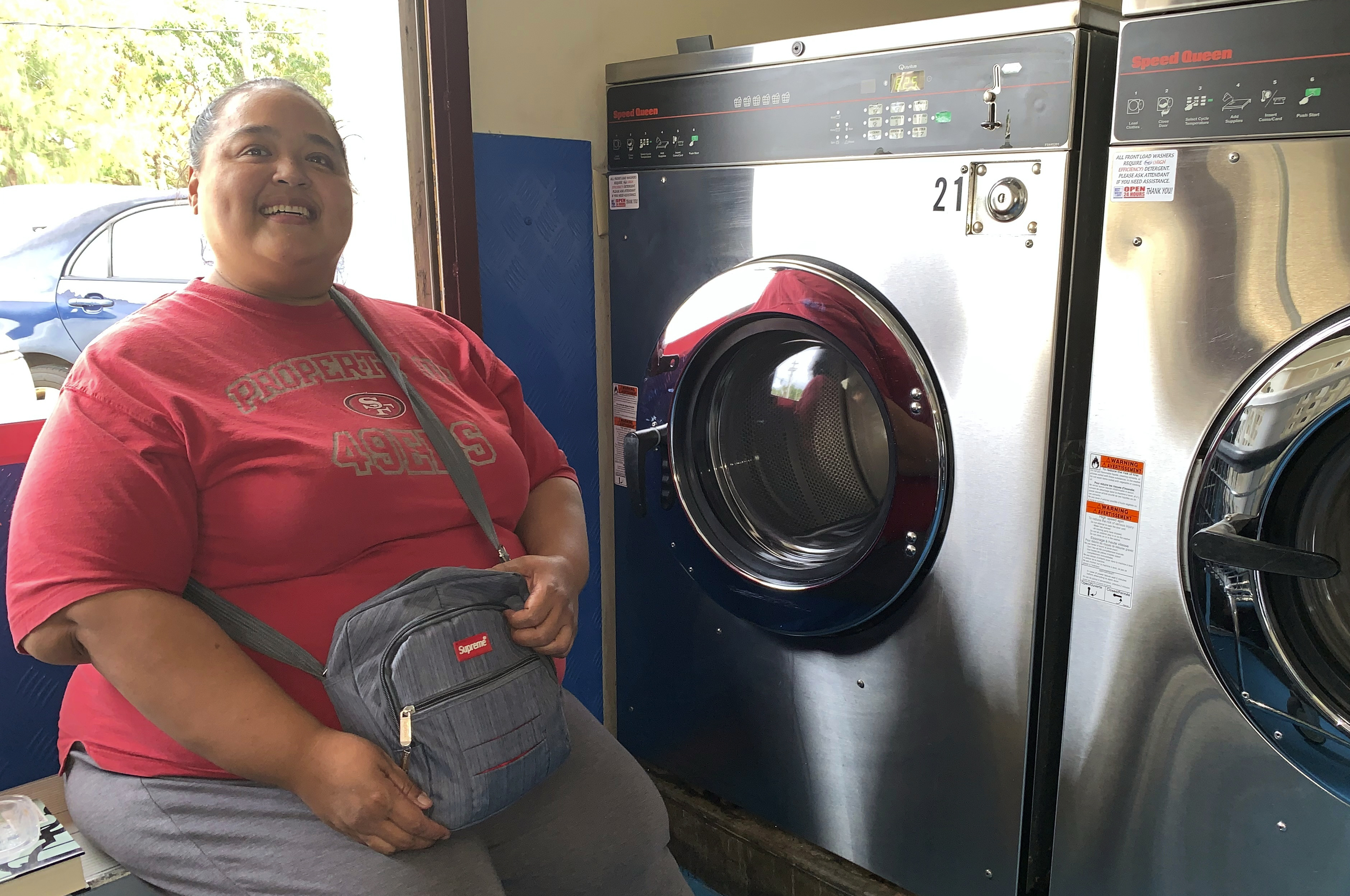 Antoninette Arriola does her laundry at a laundromat in the village of Mangilao, Guam as part of her storm preparations on Thursday, Feb. 21, 2019. An intensifying tropical storm in the Pacific is bearing down on Micronesia and could threaten the U.S. territory of Guam in the coming days. (AP Photo/Grace Garces Bordallo) Antoninette Arriola does her laundry at a laundromat in the village of Mangilao, Guam as part of her storm preparations on Thursday, Feb. 21, 2019. An intensifying tropical storm in the Pacific is bearing down on Micronesia and could threaten the U.S. territory of Guam in the coming days. (AP Photo/Grace Garces Bordallo)