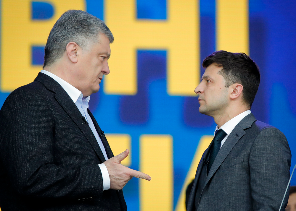 Ukrainian presidential candidate and popular comedian Volodymyr Zelenskiy listens to Ukrainian President Petro Poroshenko during their final electoral campaign debate at the Olympic stadium in Kiev, Ukraine, Friday, April 19, 2019. Friday is the last official day of election canvassing in Ukraine as all presidential candidates and their campaigns will be barred from campaigning on Saturday, the day before the vote. (AP Photo/Vadim Ghirda) Ukrainian presidential candidate and popular comedian Volodymyr Zelenskiy listens to Ukrainian President Petro Poroshenko during their final electoral campaign debate at the Olympic stadium in Kiev, Ukraine, Friday, April 19, 2019. Friday is the last official day of election canvassing in Ukraine as all presidential candidates and their campaigns will be barred from campaigning on Saturday, the day before the vote. (AP Photo/Vadim Ghirda)