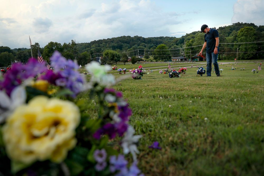 Eddie Davis steps up to the gravestone of his son Jeremy, who died from the abuse of opioids, Wednesday, July 17, 2019, in Coalton, Ohio. Newly released prescription opioid statistics underscore how widespread pill use has been in towns and small cities of America’s Appalachian region. In Jackson County, an average yearly total of 107 opioid pills for every resident were distributed over a seven-year period. (AP Photo/John Minchillo) Eddie Davis steps up to the gravestone of his son Jeremy, who died from the abuse of opioids, Wednesday, July 17, 2019, in Coalton, Ohio. Newly released prescription opioid statistics underscore how widespread pill use has been in towns and small cities of America’s Appalachian region. In Jackson County, an average yearly total of 107 opioid pills for every resident were distributed over a seven-year period. (AP Photo/John Minchillo)