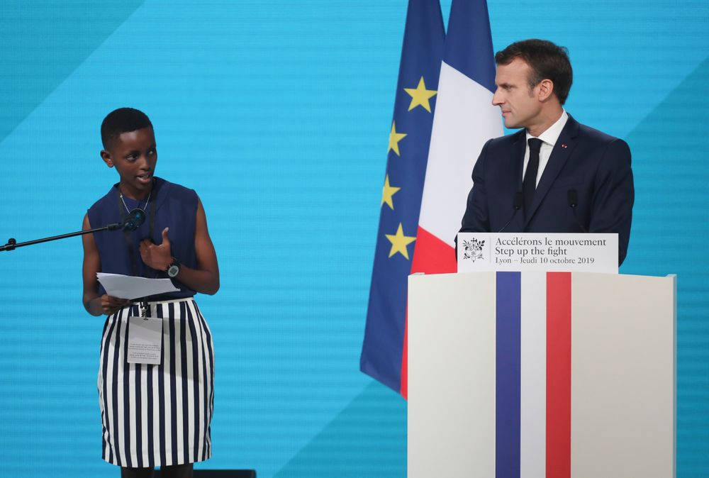 France's President Emmanuel Macron, right, listening to the goodwill ambassador of the ONG France's President Emmanuel Macron, right, listening to the goodwill ambassador of the ONG