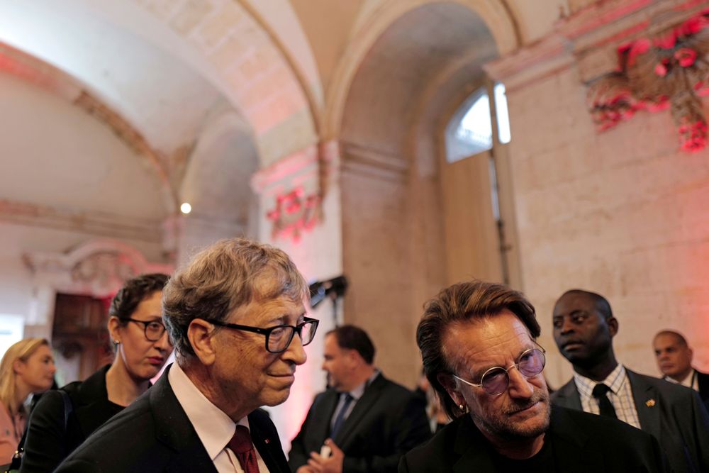 US Microsoft founder, Co-Chairman of the Bill & Melinda Gates Foundation, Bill Gates, left, and Irish rock band U2 singer Bono arrive at the City Hall of Lyon, central France, Wednesday Oct.9 2019, ahead of the two-day conference of Global Fund to Fight HIV, Tuberculosis and Malaria. (Olivier Chassignole, Pool via AP) US Microsoft founder, Co-Chairman of the Bill & Melinda Gates Foundation, Bill Gates, left, and Irish rock band U2 singer Bono arrive at the City Hall of Lyon, central France, Wednesday Oct.9 2019, ahead of the two-day conference of Global Fund to Fight HIV, Tuberculosis and Malaria. (Olivier Chassignole, Pool via AP)