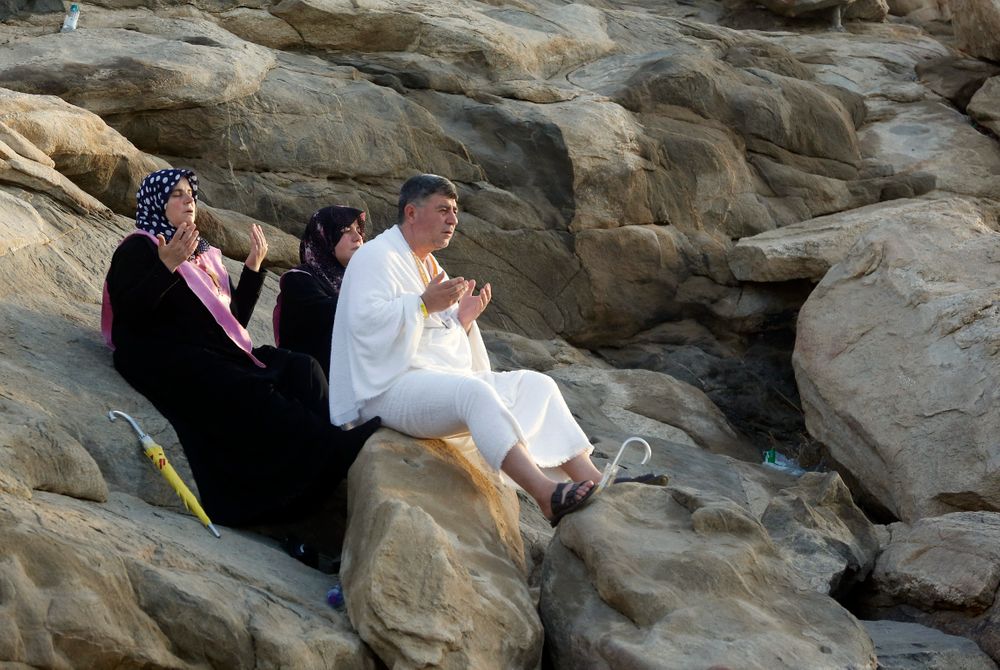 Muslim pilgrims pray on a rocky hill known as Mountain of Mercy, on the Plain of Arafat, during the annual hajj pilgrimage, near the holy city of Mecca, Saudi Arabia, Saturday, Aug. 10, 2019. More than 2 million pilgrims were gathered to perform initial rites of the hajj, an Islamic pilgrimage that takes the faithful along a path traversed by the Prophet Muhammad some 1,400 years ago. (AP Photo/Amr Nabil) Muslim pilgrims pray on a rocky hill known as Mountain of Mercy, on the Plain of Arafat, during the annual hajj pilgrimage, near the holy city of Mecca, Saudi Arabia, Saturday, Aug. 10, 2019. More than 2 million pilgrims were gathered to perform initial rites of the hajj, an Islamic pilgrimage that takes the faithful along a path traversed by the Prophet Muhammad some 1,400 years ago. (AP Photo/Amr Nabil)