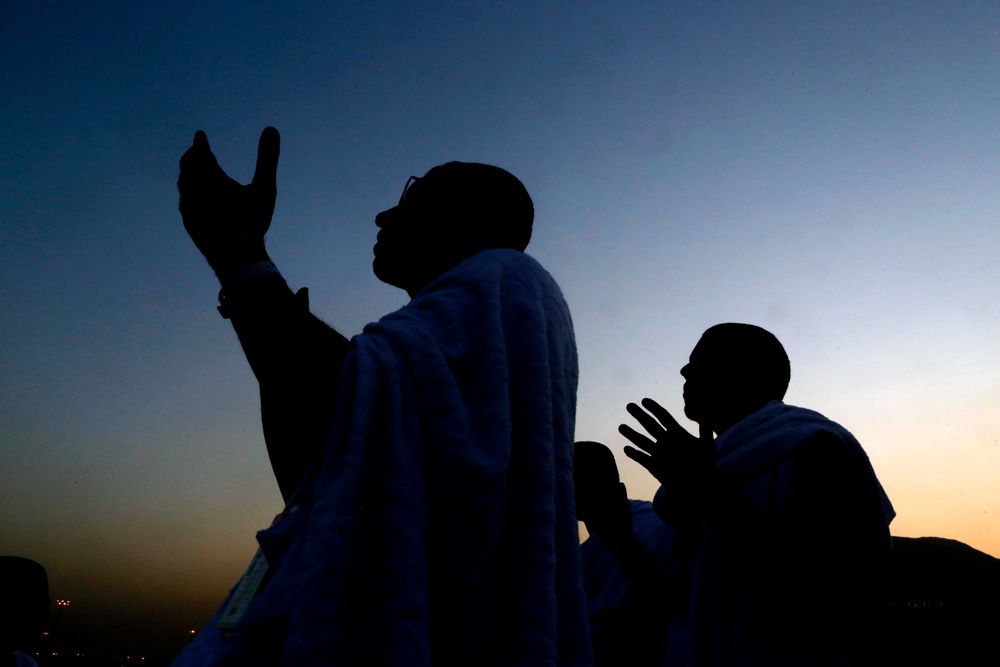 Muslim pilgrims pray on a rocky hill known as Mountain of Mercy, on the Plain of Arafat, during the annual hajj pilgrimage ahead of sunrise near the holy city of Mecca, Saudi Arabia, Saturday, Aug. 10, 2019. More than 2 million pilgrims were gathered to perform initial rites of the hajj, an Islamic pilgrimage that takes the faithful along a path traversed by the Prophet Muhammad some 1,400 years ago. (AP Photo/Amr Nabil) Muslim pilgrims pray on a rocky hill known as Mountain of Mercy, on the Plain of Arafat, during the annual hajj pilgrimage ahead of sunrise near the holy city of Mecca, Saudi Arabia, Saturday, Aug. 10, 2019. More than 2 million pilgrims were gathered to perform initial rites of the hajj, an Islamic pilgrimage that takes the faithful along a path traversed by the Prophet Muhammad some 1,400 years ago. (AP Photo/Amr Nabil)