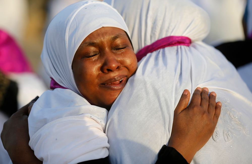 Sudanese pilgrims embrace as they congratulate each other for performing the annual hajj pilgrimage near the Mountain of Mercy, on the Plain of Arafat, near the holy city of Mecca, Saudi Arabia, Saturday, Aug. 10, 2019. More than 2 million pilgrims were gathered to perform initial rites of the hajj, an Islamic pilgrimage that takes the faithful along a path traversed by the Prophet Muhammad some 1,400 years ago. (AP Photo/Amr Nabil) Sudanese pilgrims embrace as they congratulate each other for performing the annual hajj pilgrimage near the Mountain of Mercy, on the Plain of Arafat, near the holy city of Mecca, Saudi Arabia, Saturday, Aug. 10, 2019. More than 2 million pilgrims were gathered to perform initial rites of the hajj, an Islamic pilgrimage that takes the faithful along a path traversed by the Prophet Muhammad some 1,400 years ago. (AP Photo/Amr Nabil)