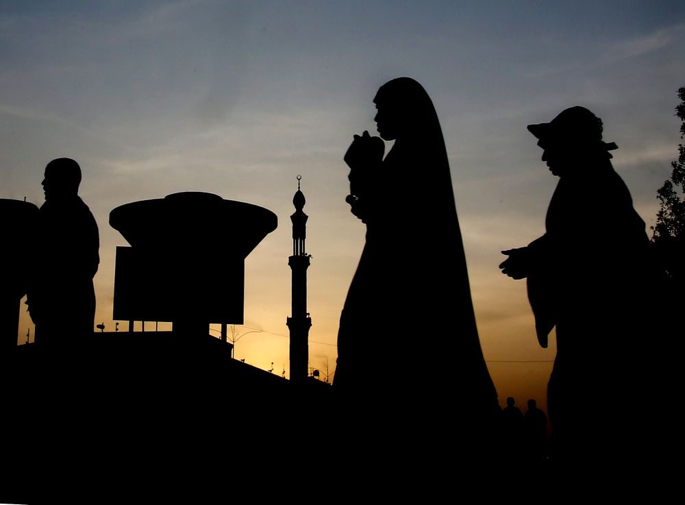 Pilgrims walk outside Namira Mosque in Arafat, in Mecca, Saudi Arabia, Friday, Aug. 9, 2019. More than 2 million pilgrims were gathered in the holy city of Mecca in Saudi Arabia on Friday to perform initial rites of the Hajj, an Islamic pilgrimage that takes the faithful along a path traversed by the Prophet Muhammad some 1,400 years ago. (AP Photo/Amr Nabil) Pilgrims walk outside Namira Mosque in Arafat, in Mecca, Saudi Arabia, Friday, Aug. 9, 2019. More than 2 million pilgrims were gathered in the holy city of Mecca in Saudi Arabia on Friday to perform initial rites of the Hajj, an Islamic pilgrimage that takes the faithful along a path traversed by the Prophet Muhammad some 1,400 years ago. (AP Photo/Amr Nabil)